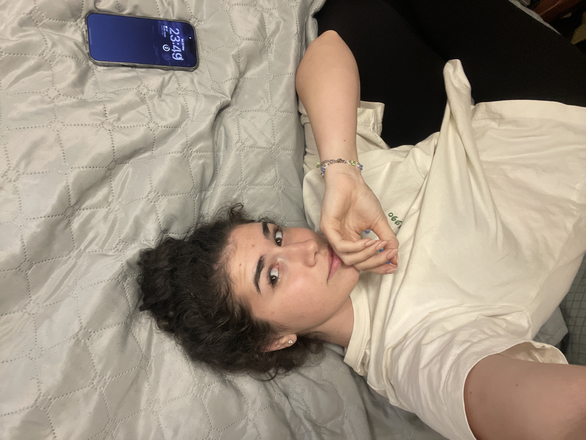 Woman and dog share quiet evening moments in Sofia bedroom