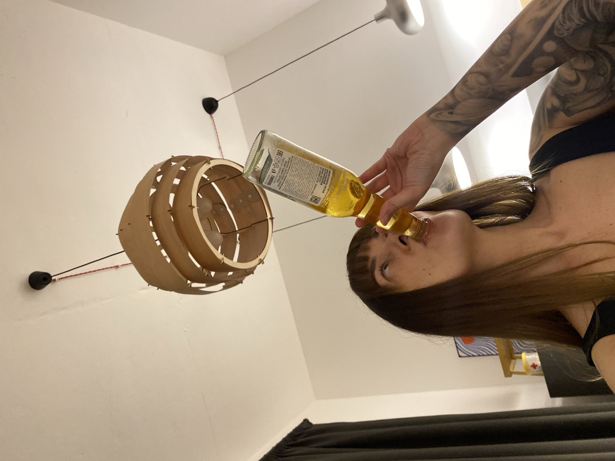Woman takes selfie in modern interior space in Izhevsk