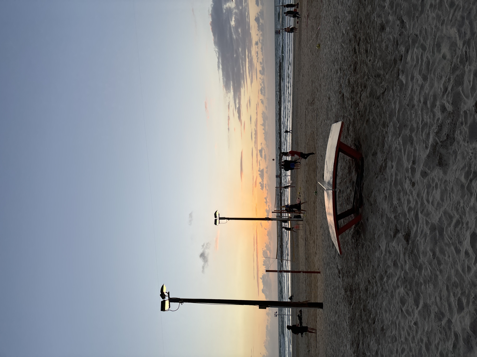 Tel Aviv beachgoers enjoy sunset activities on sand