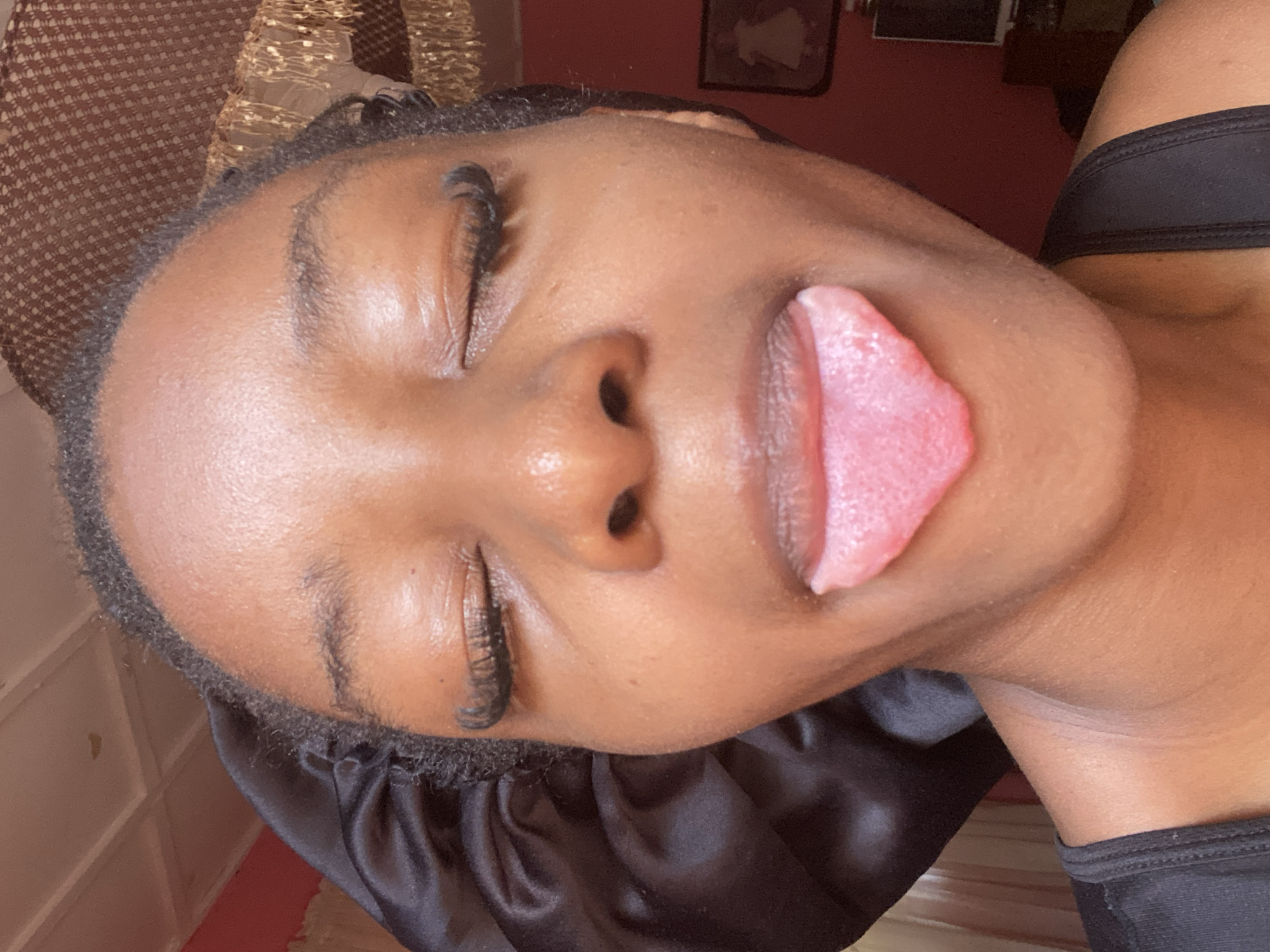 Selfie session in Jos featuring expressive poses and detailed nail art