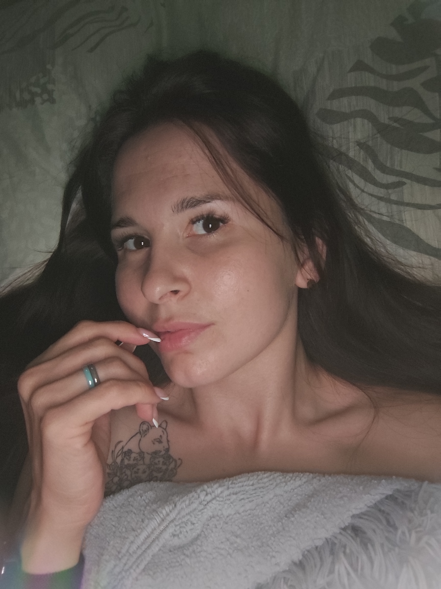 Woman photographed in bedroom setting in Фоки, Russia