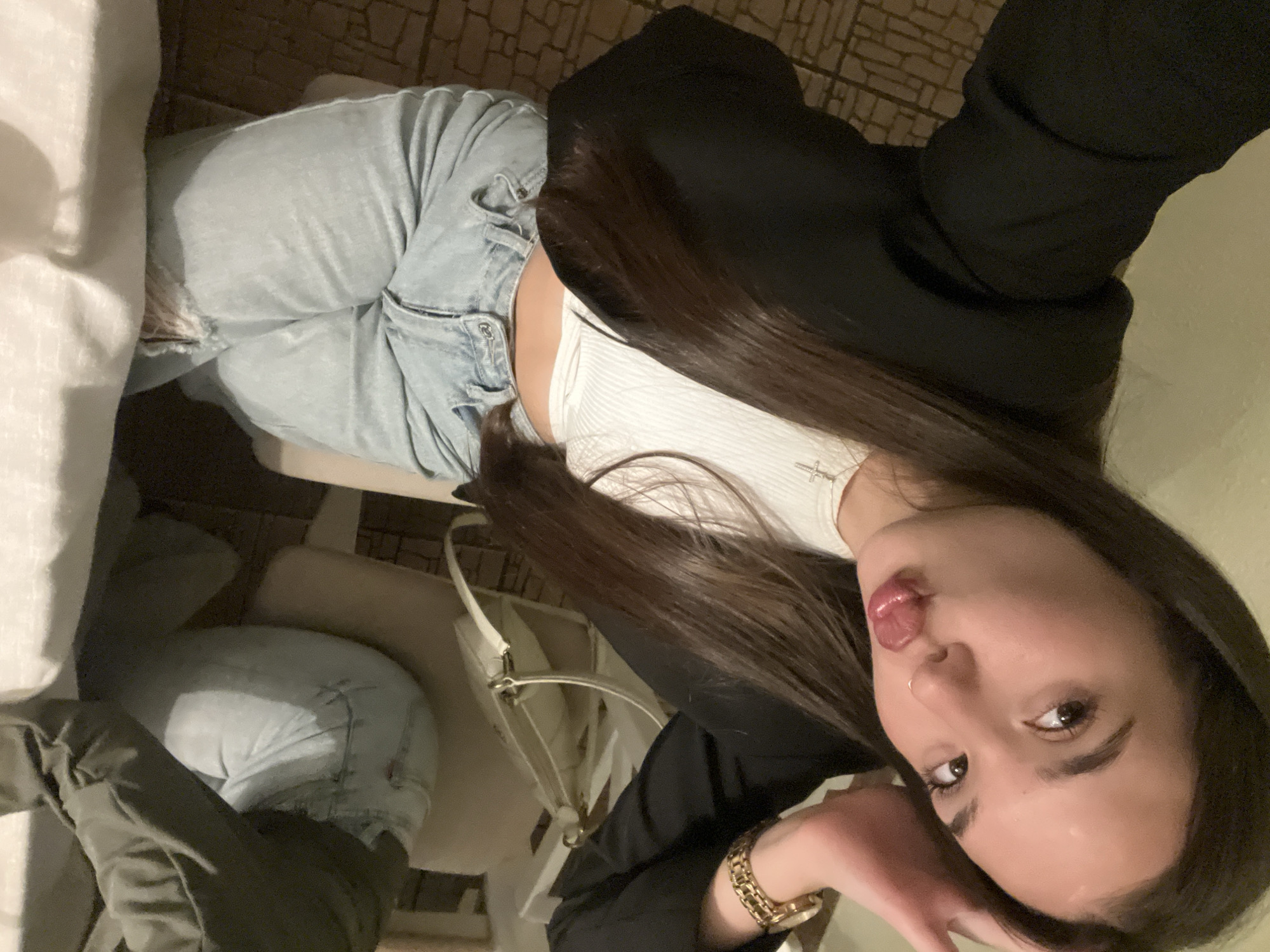 Women pose for selfies with drinks in Chaikovsky