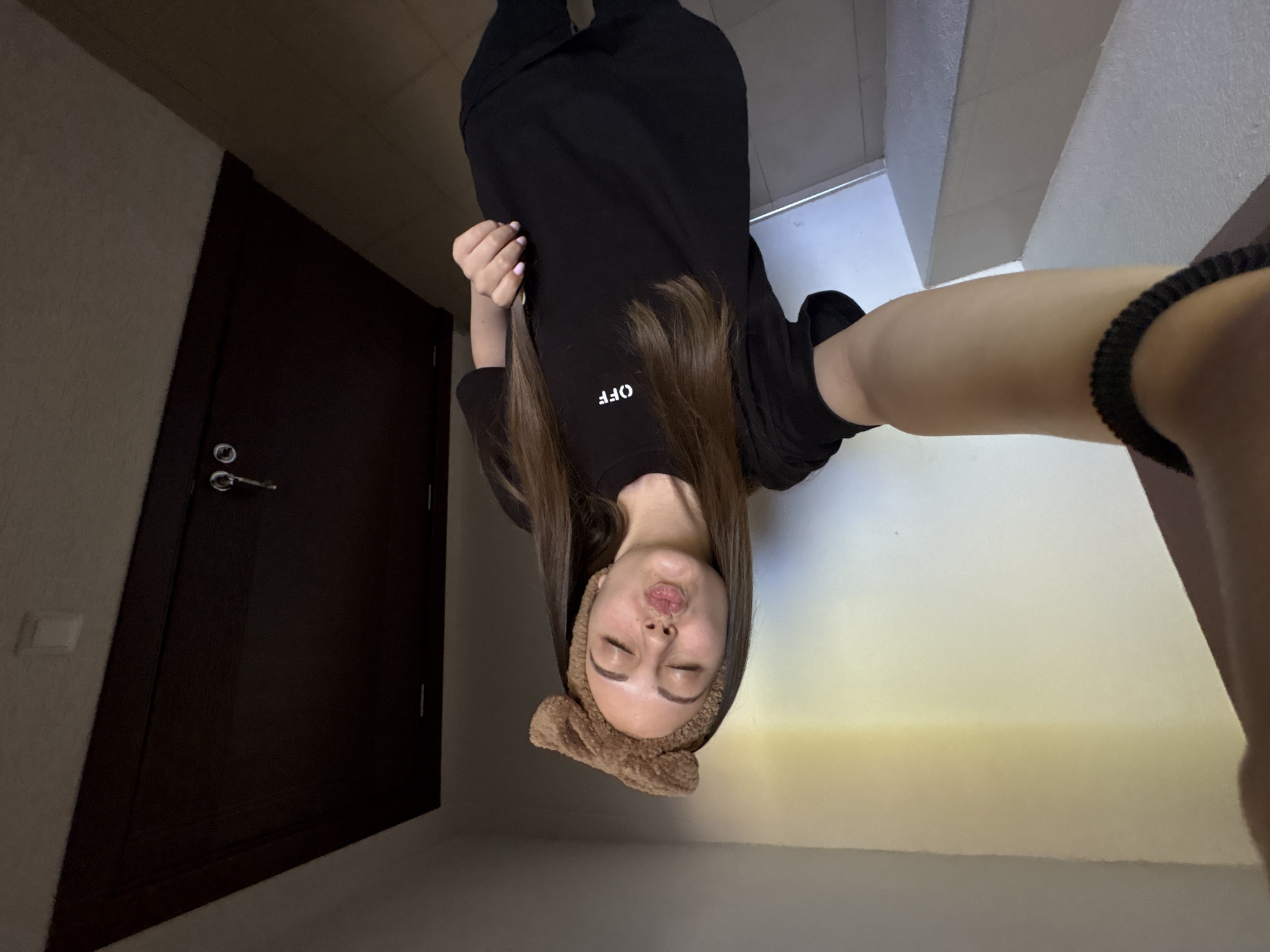 Woman documents morning routine through selfies in Bulgarian home