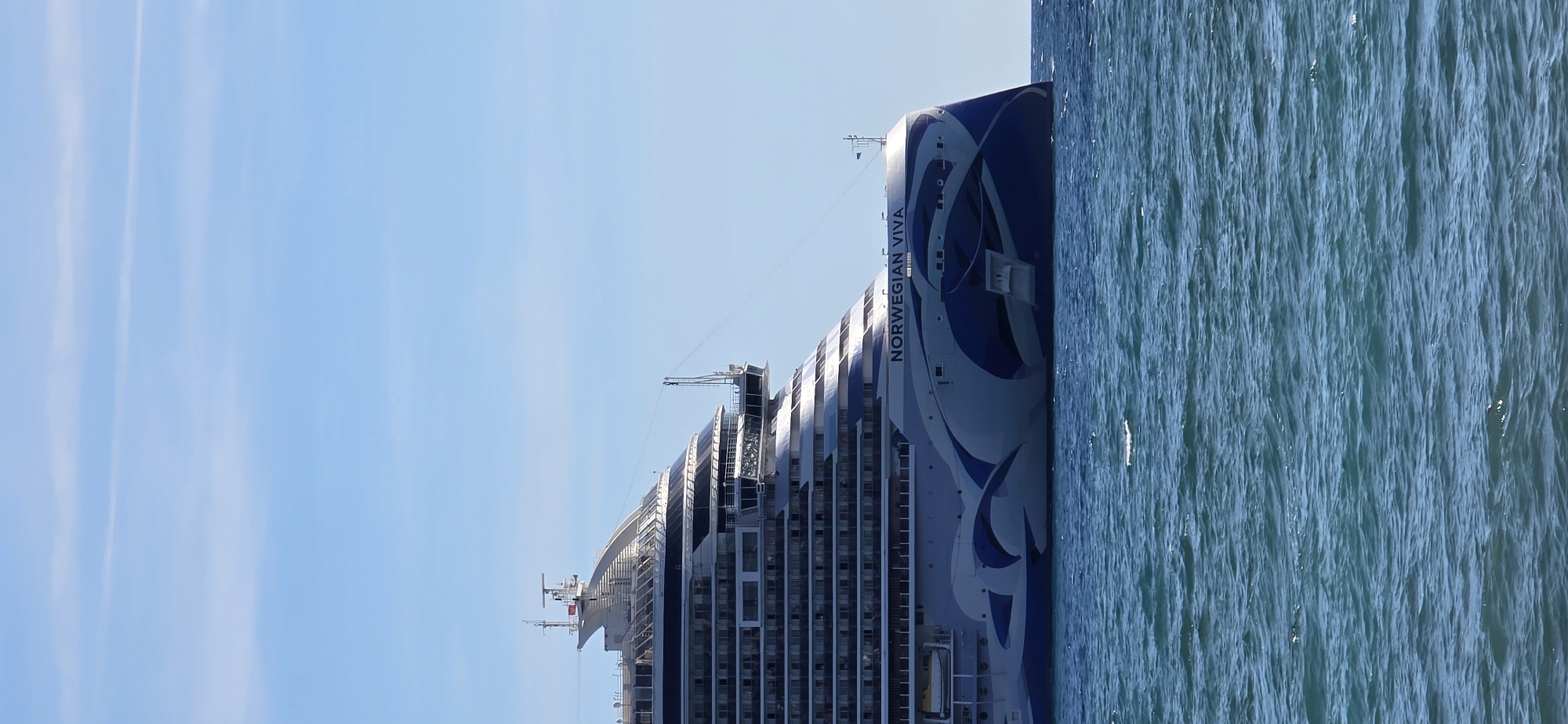 Cruise ship anchored off Bar Montenegro during busy afternoon