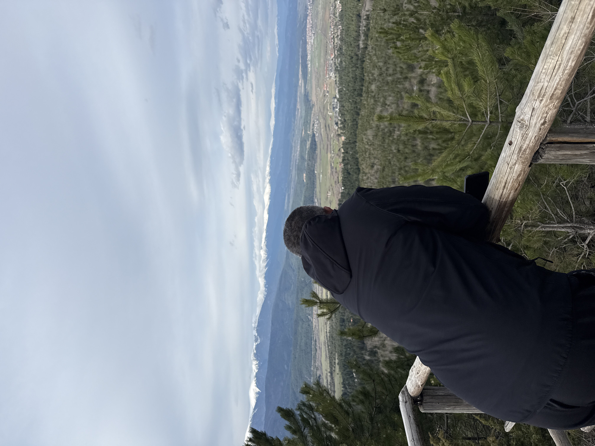 Visitors gather at Razlog scenic overlook for valley views