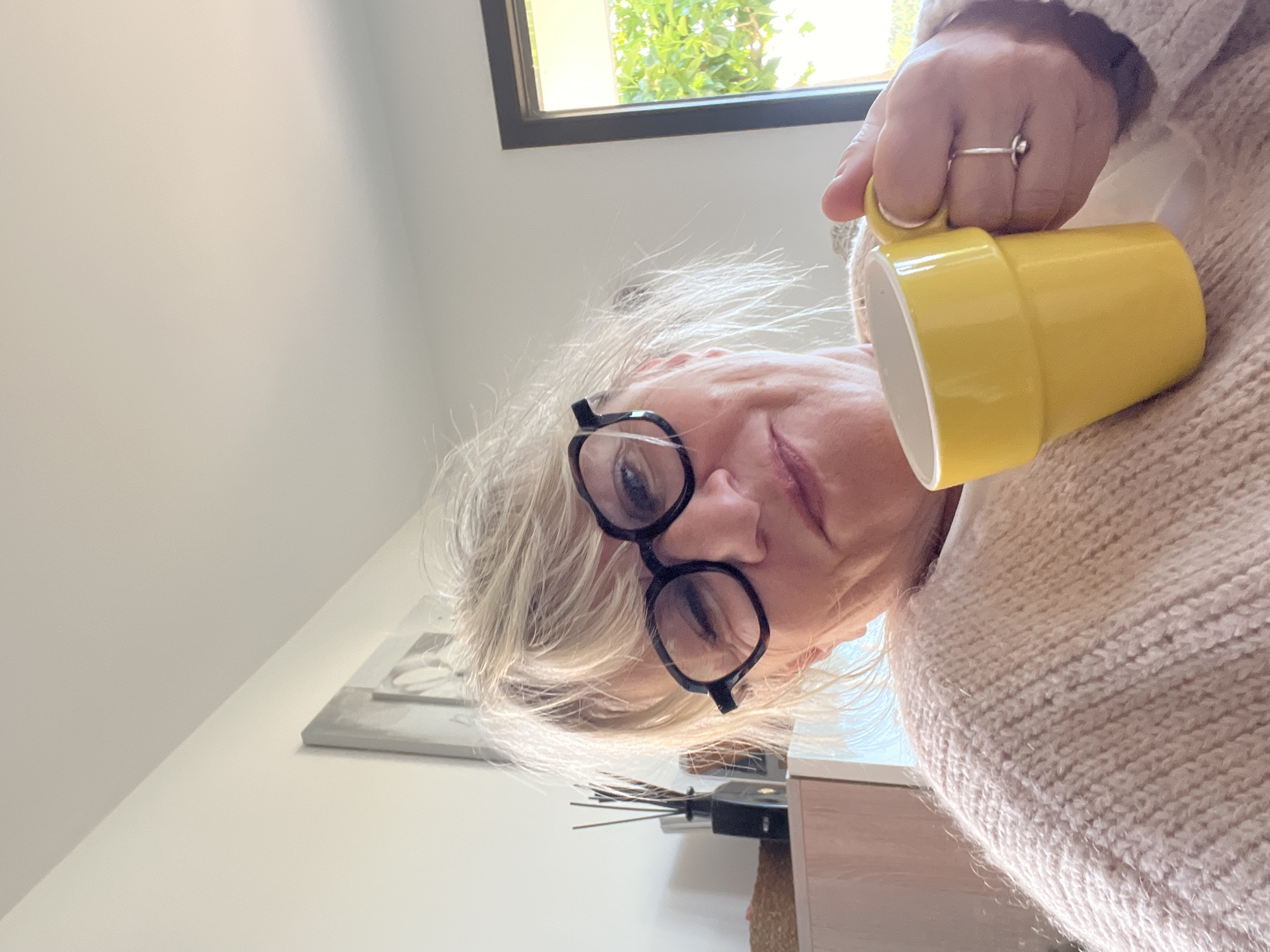 Woman photographed indoors in Chambœuf, France Saturday morning