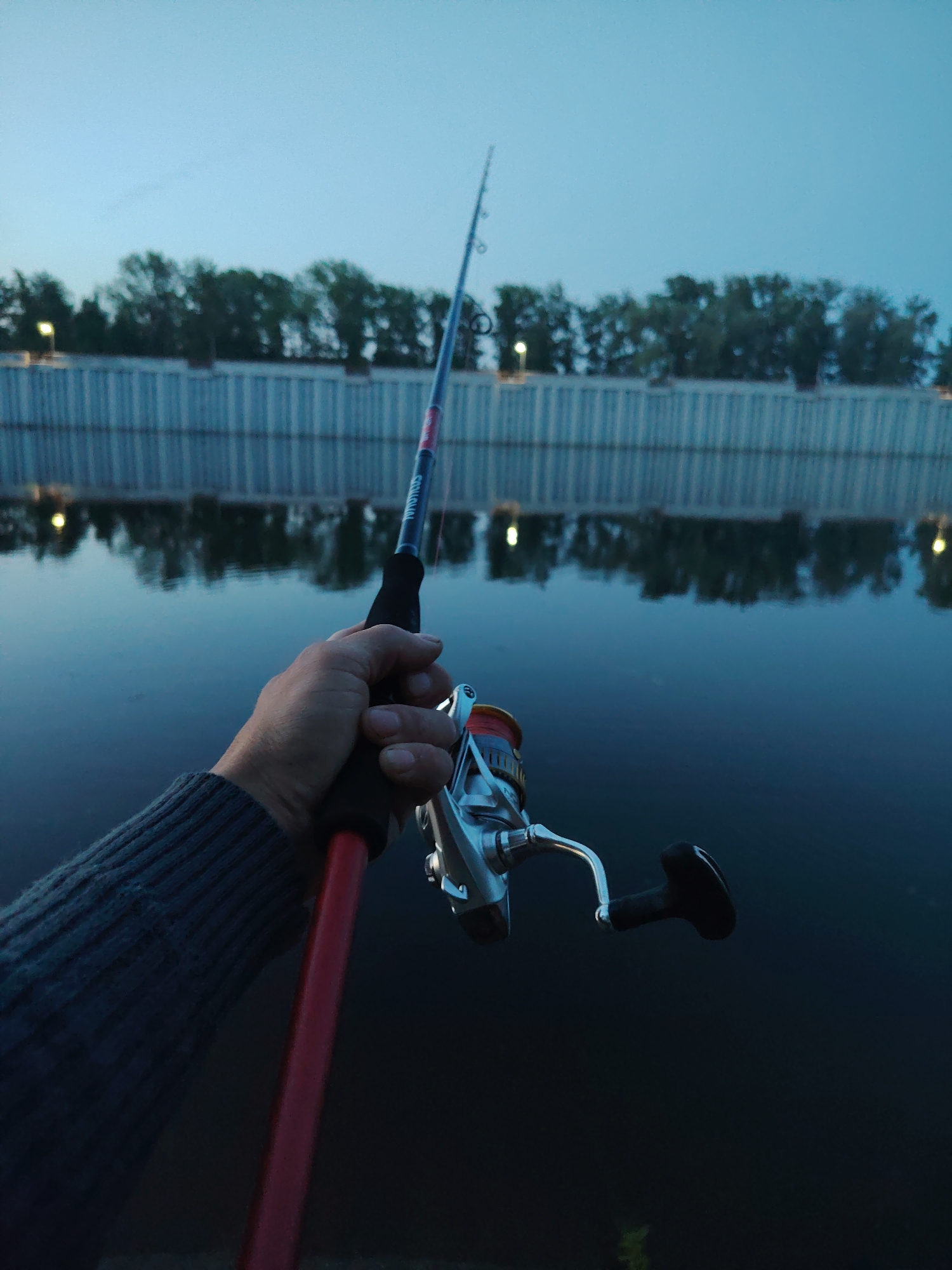Twilight fishing session recorded at Chaikovsky ship lock, Russia