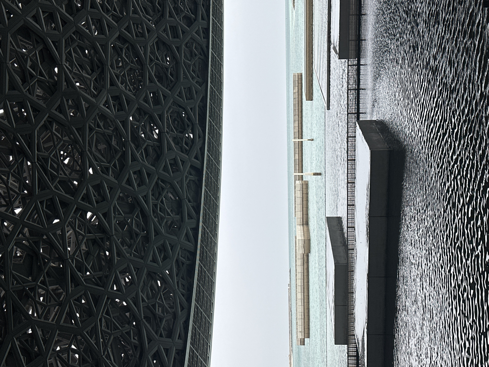 Visitor explores Louvre Abu Dhabi's architecture and art displays