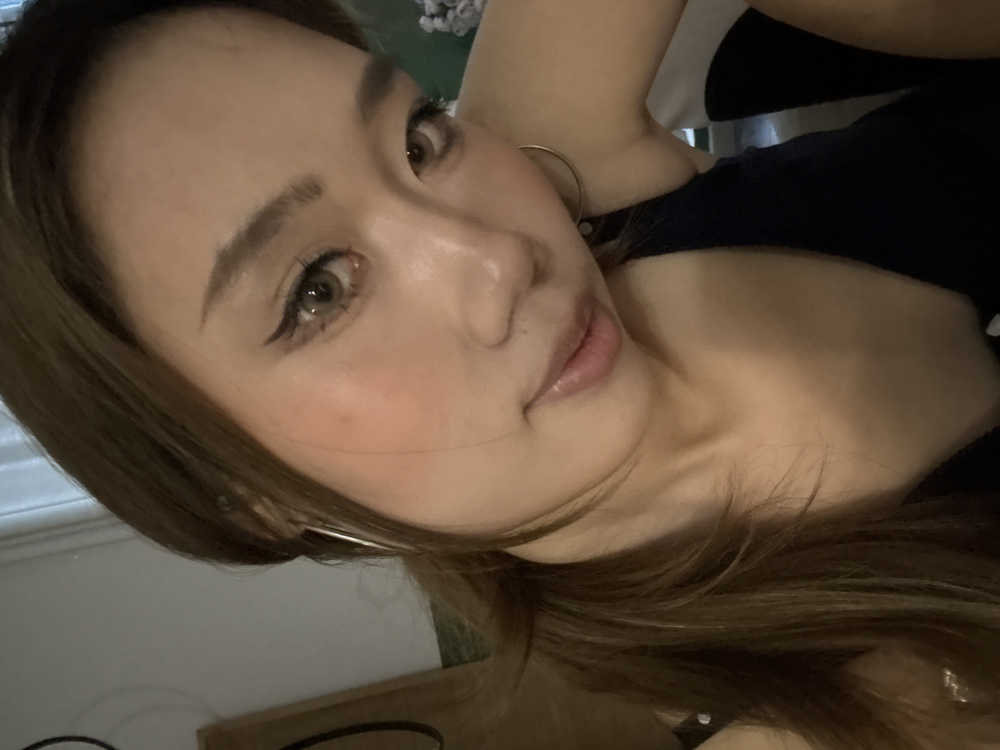 Woman takes selfies on bed in Liangjiang, China