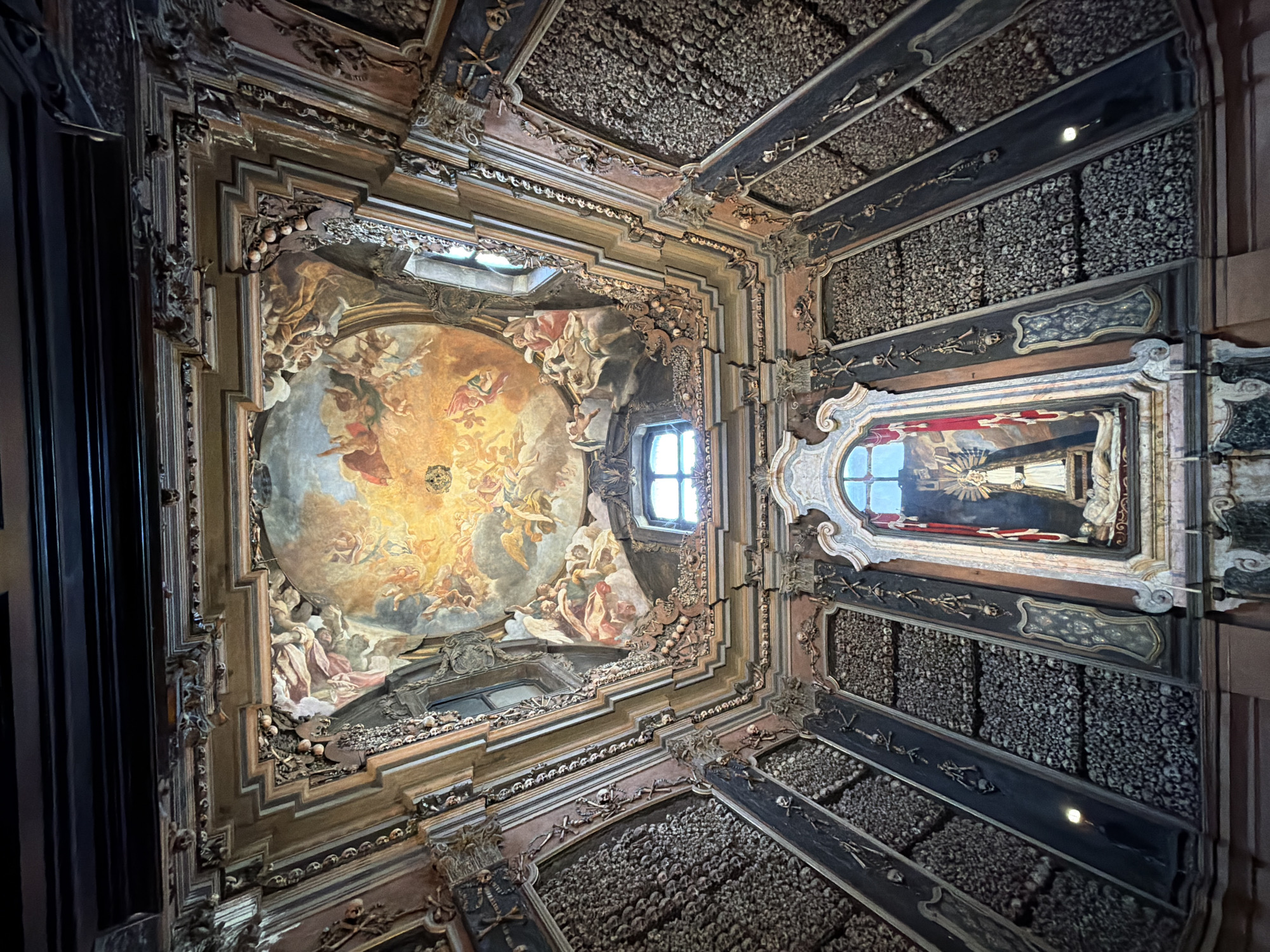 Tourist documents Milan's historic bone church and cathedral views