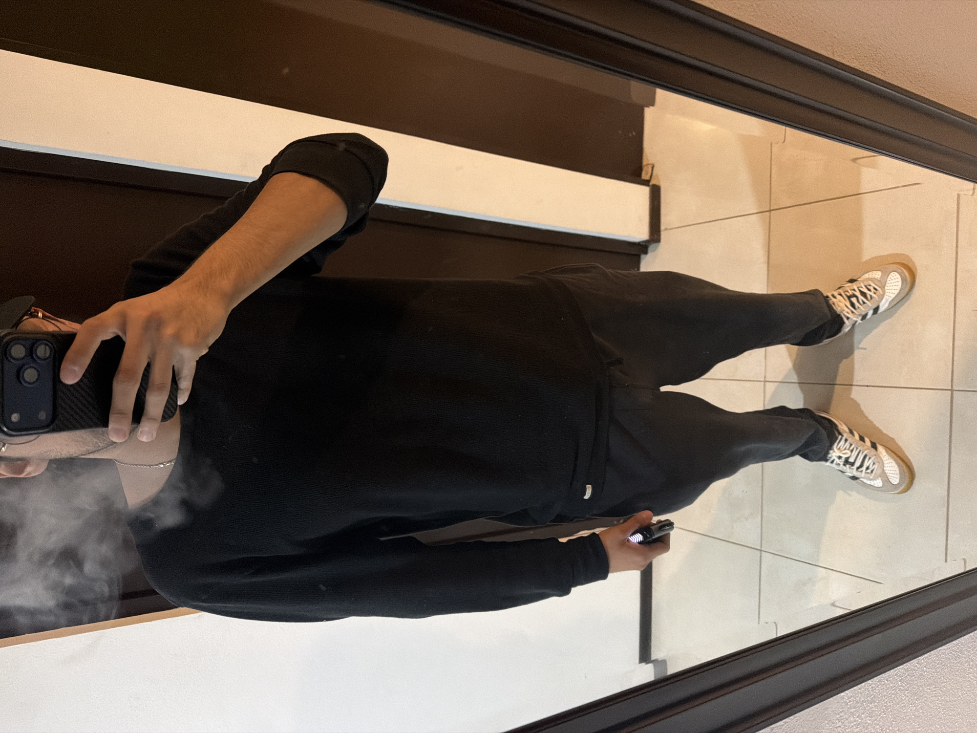 Man takes bathroom mirror selfie in San Andrés Cholula
