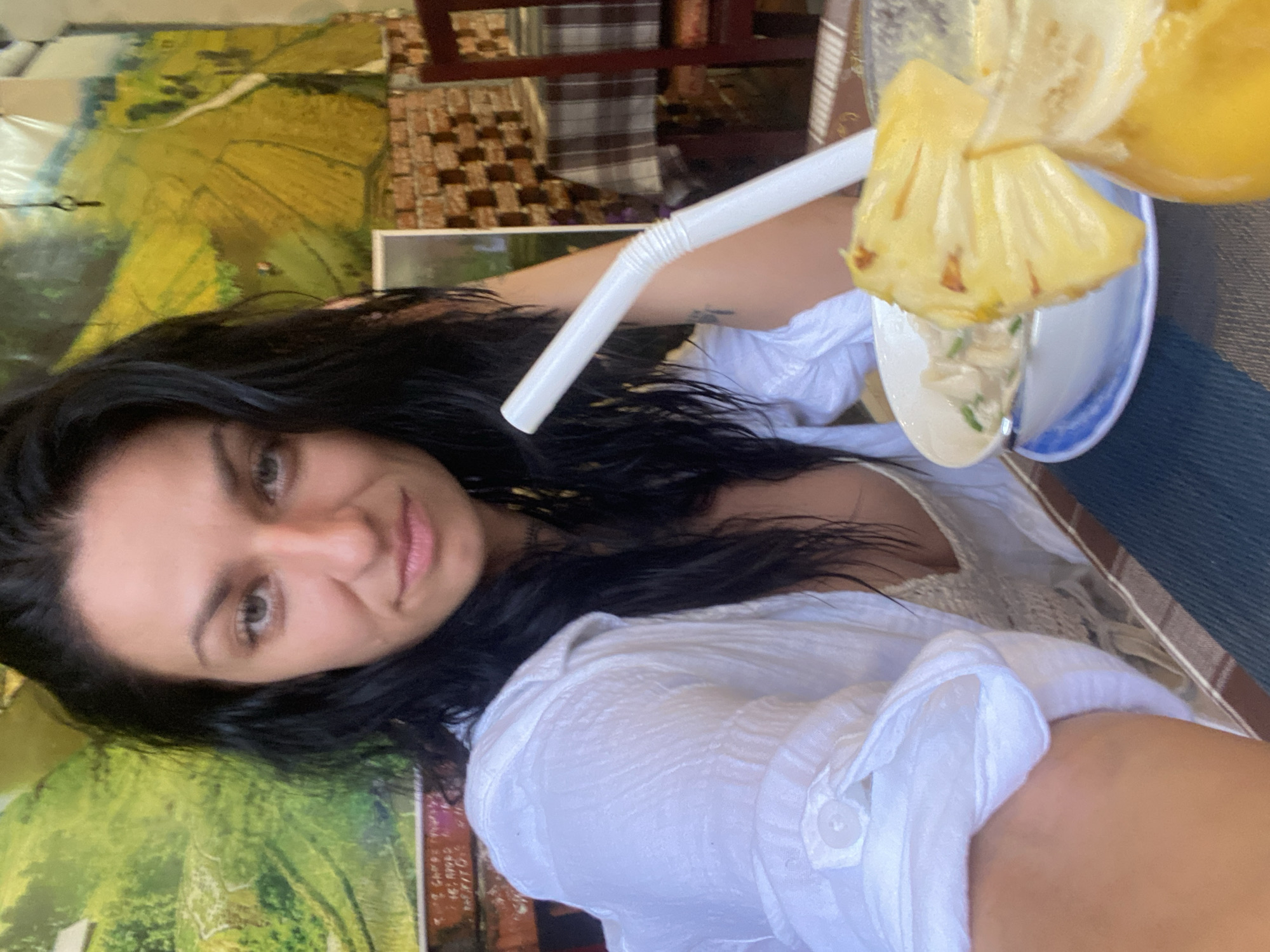 Two friends enjoy leisurely restaurant meal in Vietnam