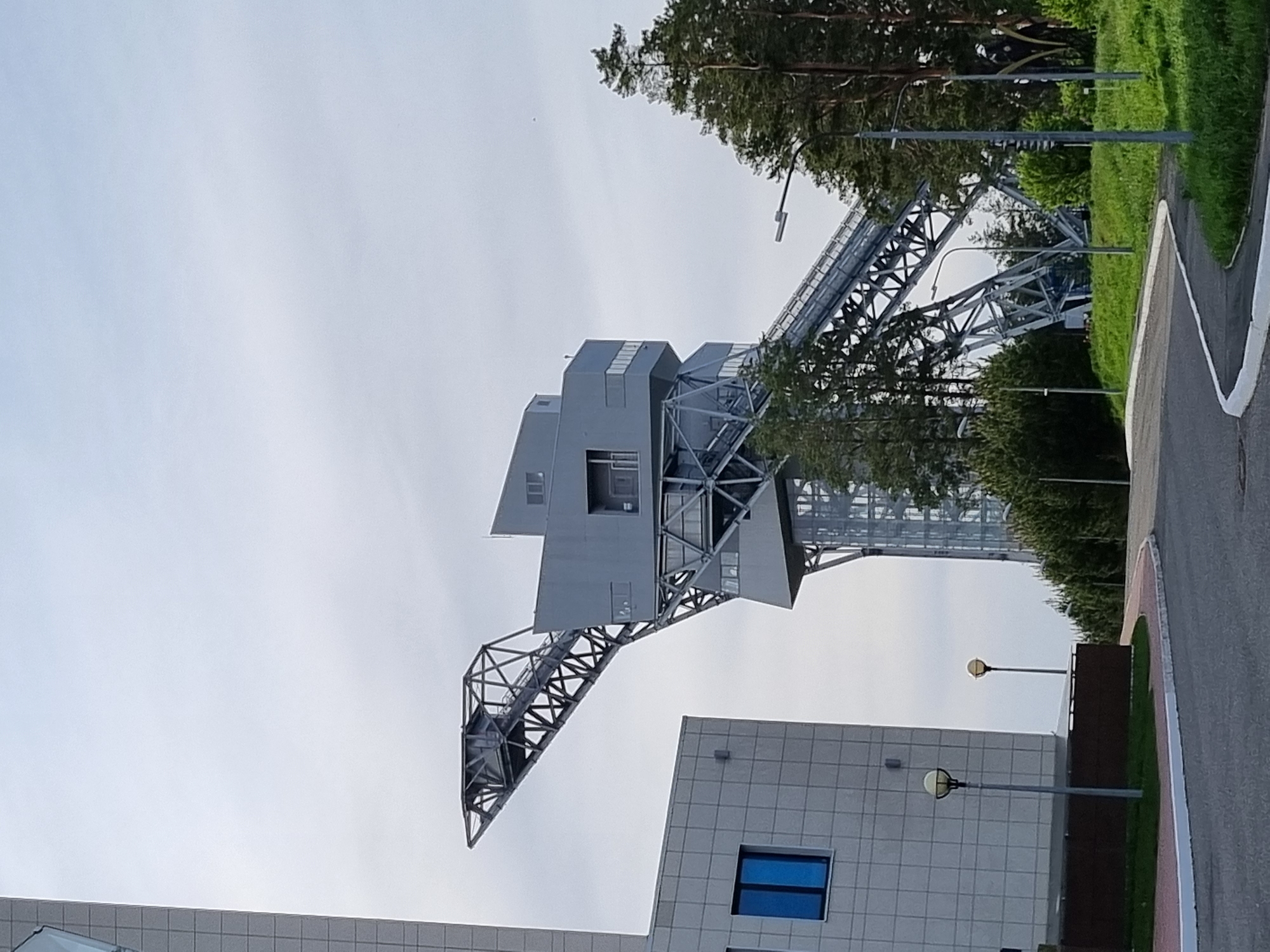 Tourist documents observation tower, buildings in Прикамский, Russia