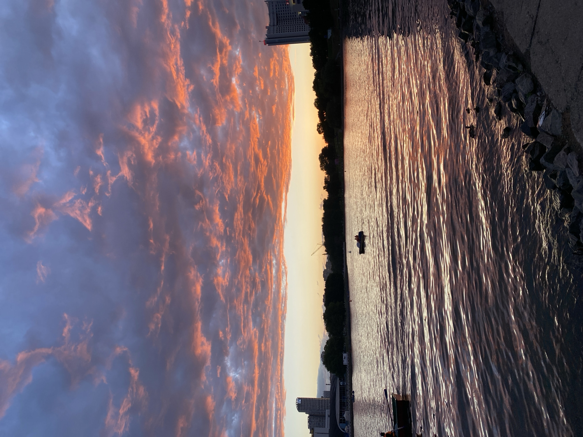Minsk sunset paints the Svislach River and streets in vivid color
