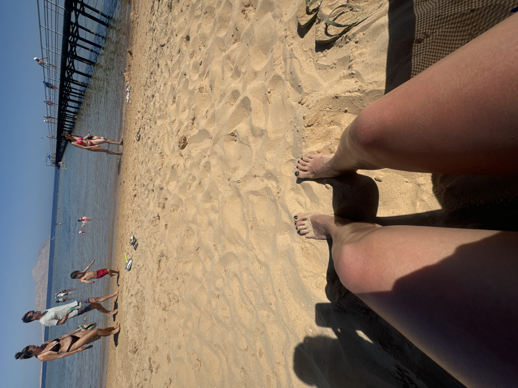 Beach moment captured from personal perspective in Sharm El Sheikh
