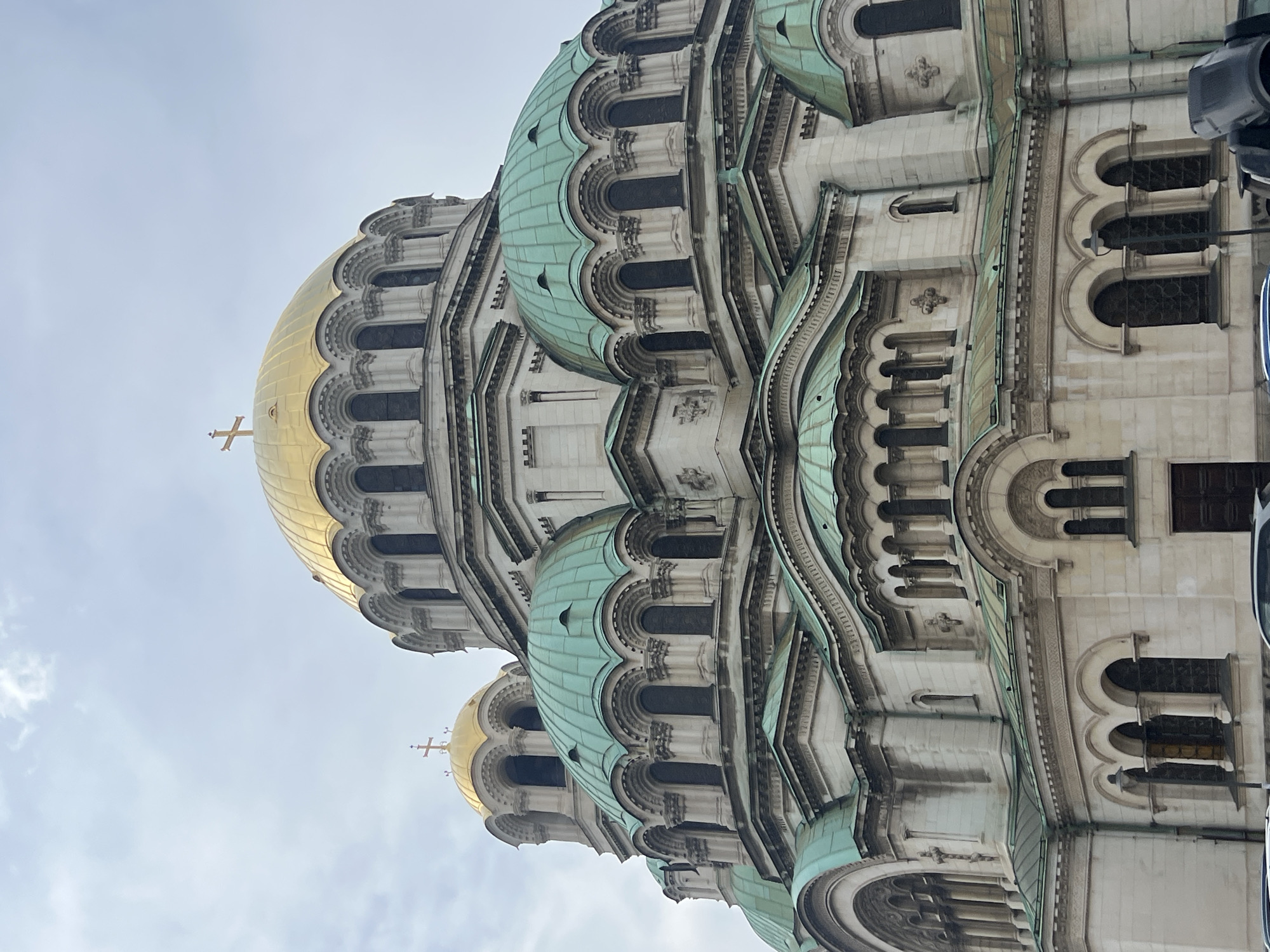 Tourist documents Sofia landmarks during afternoon walking tour