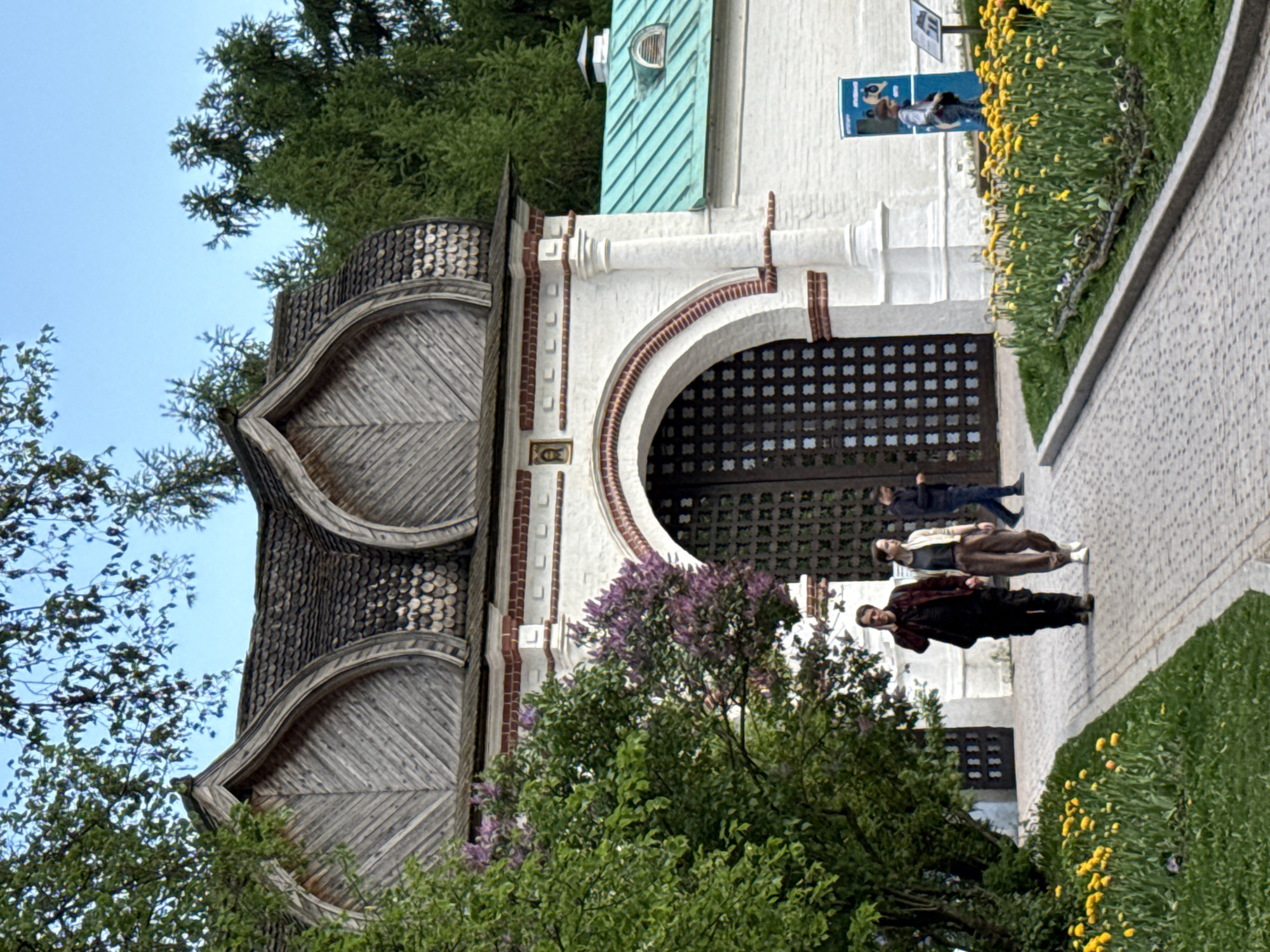 Visitor documents historic Kolomenskoye Estate architecture in Moscow
