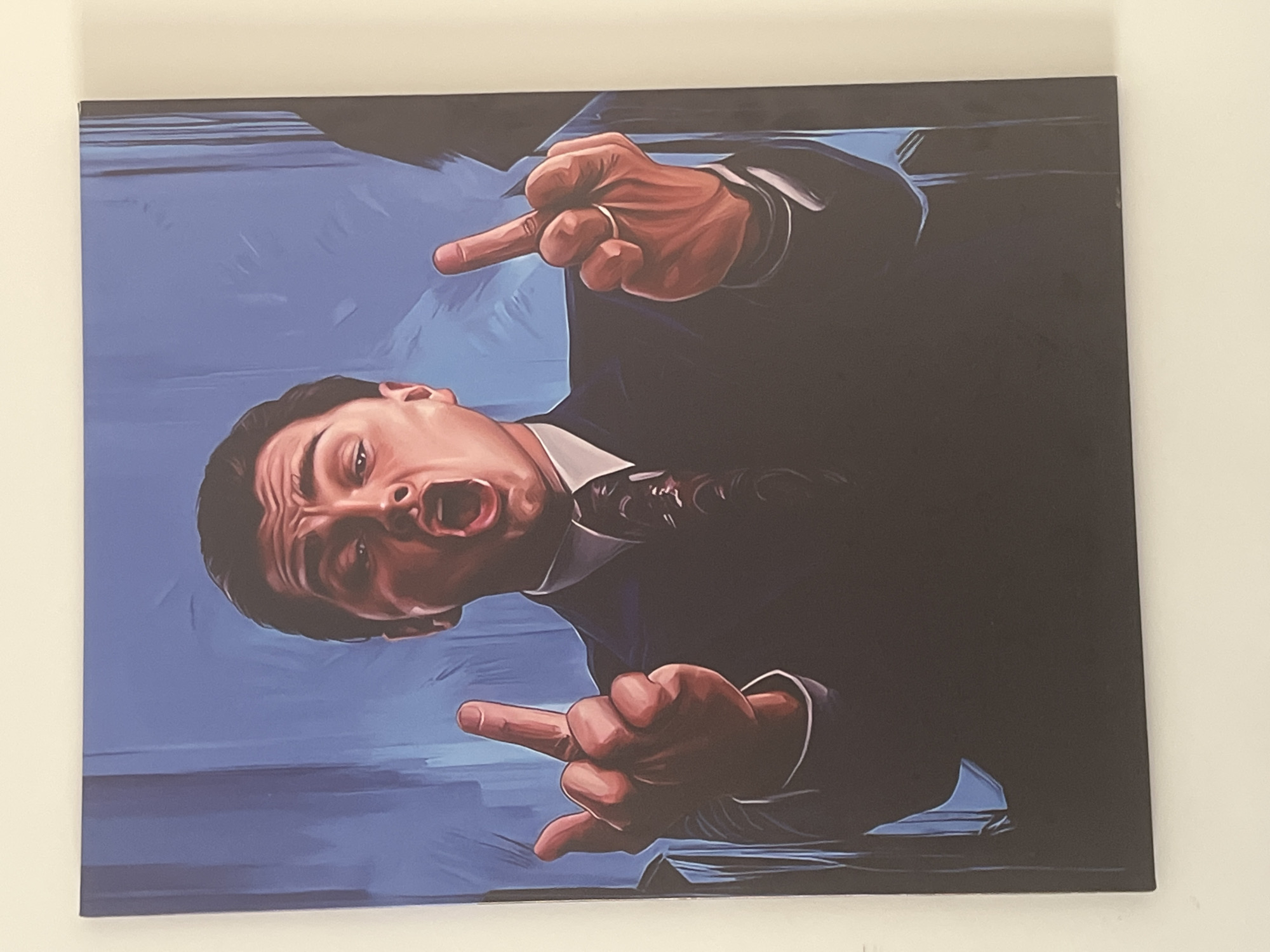 Canvas painting shows suited man making obscene gesture in Astana