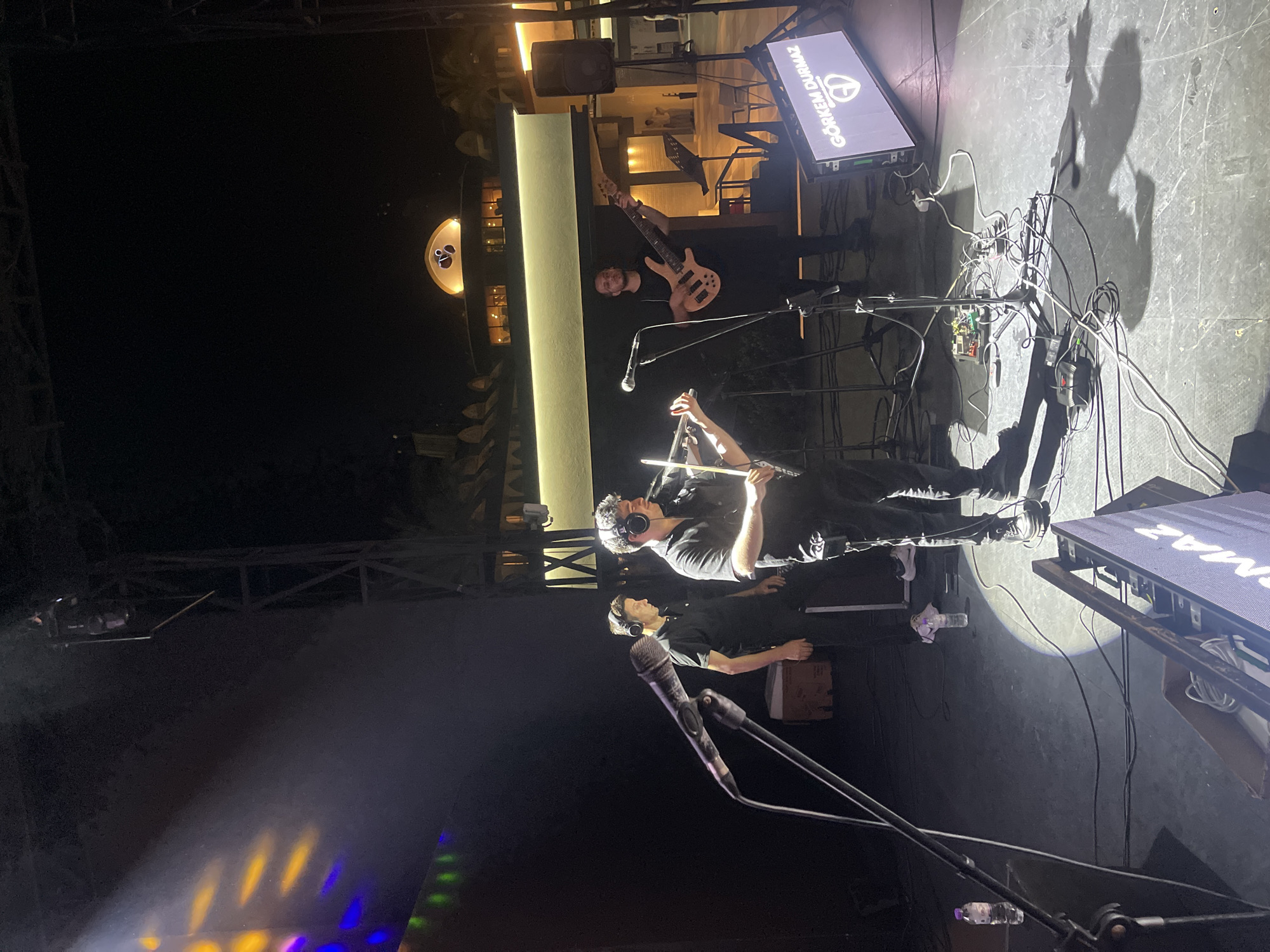 Live band plays outdoor stage at Kemer resort venue
