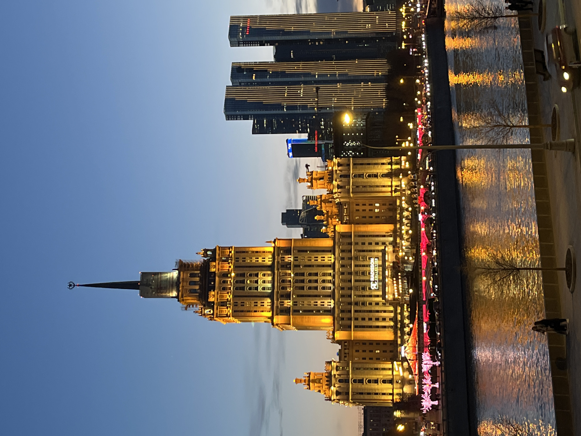 Moscow landmarks illuminated in golden and orange lights captured