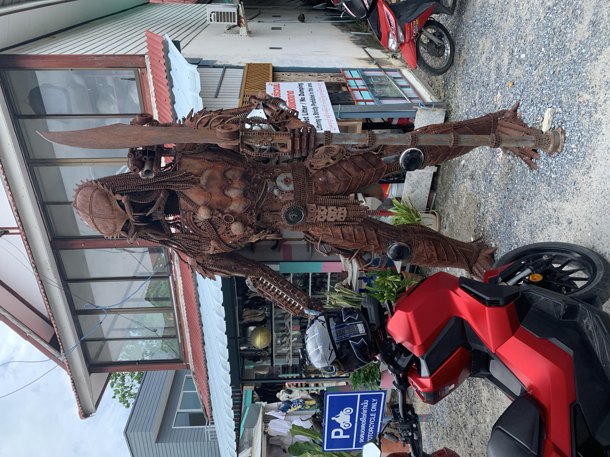 Tourist explores Baan Plai Laem temples, shops, coastal views