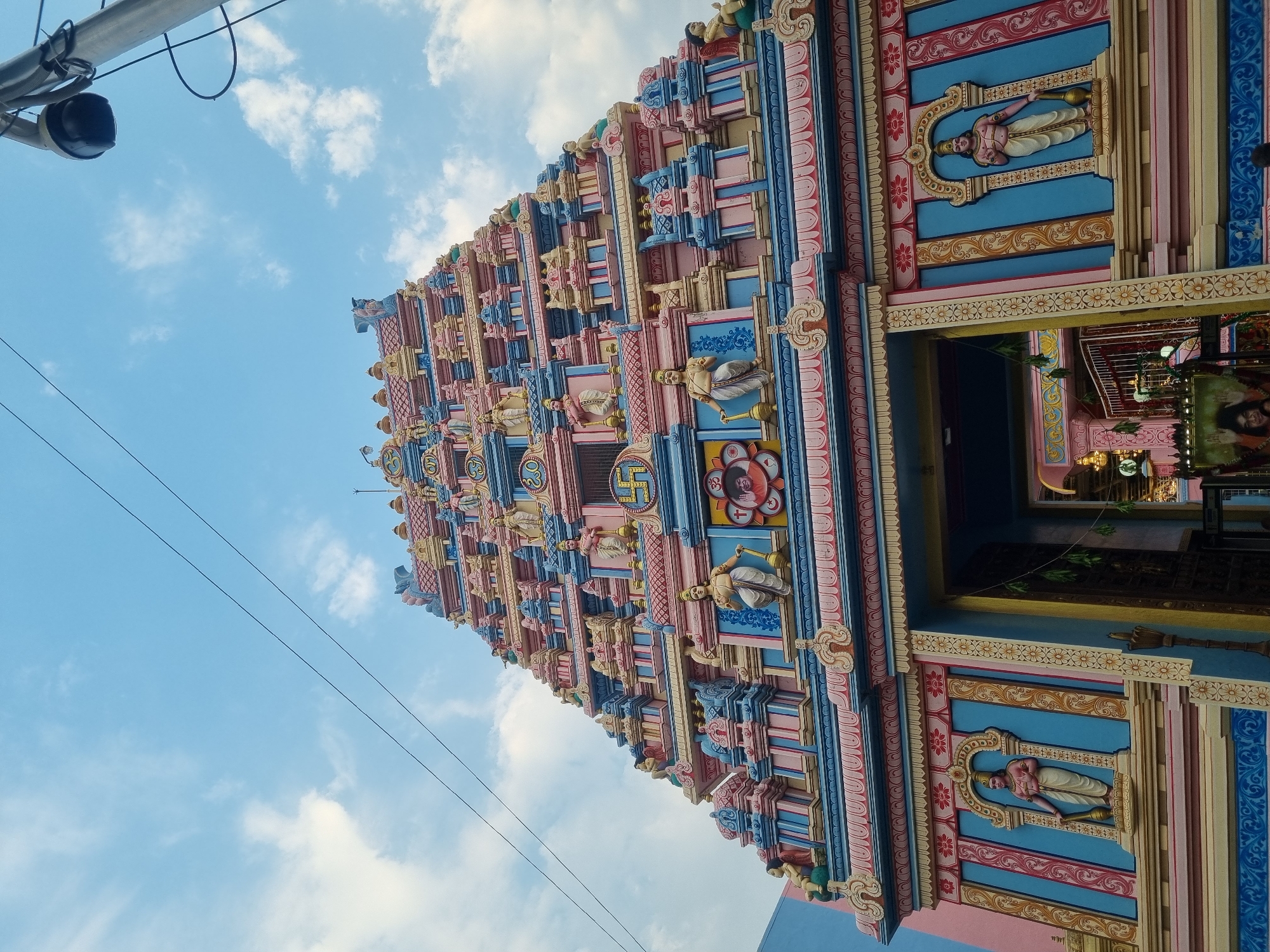 Everyday scenes captured across Puttaparthi, India during midday