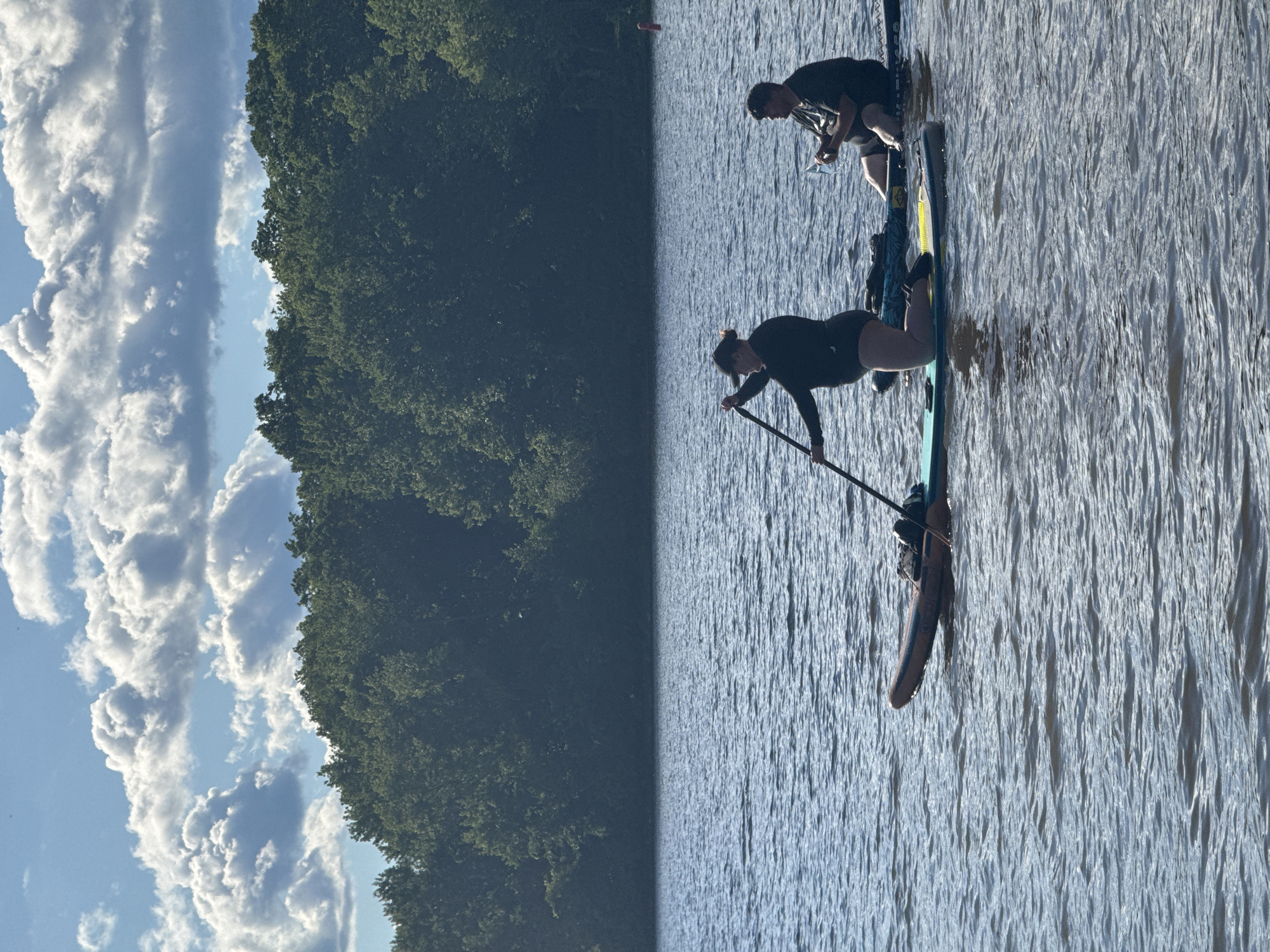 Paddleboarding on the Ottawa River on a clear summer evening