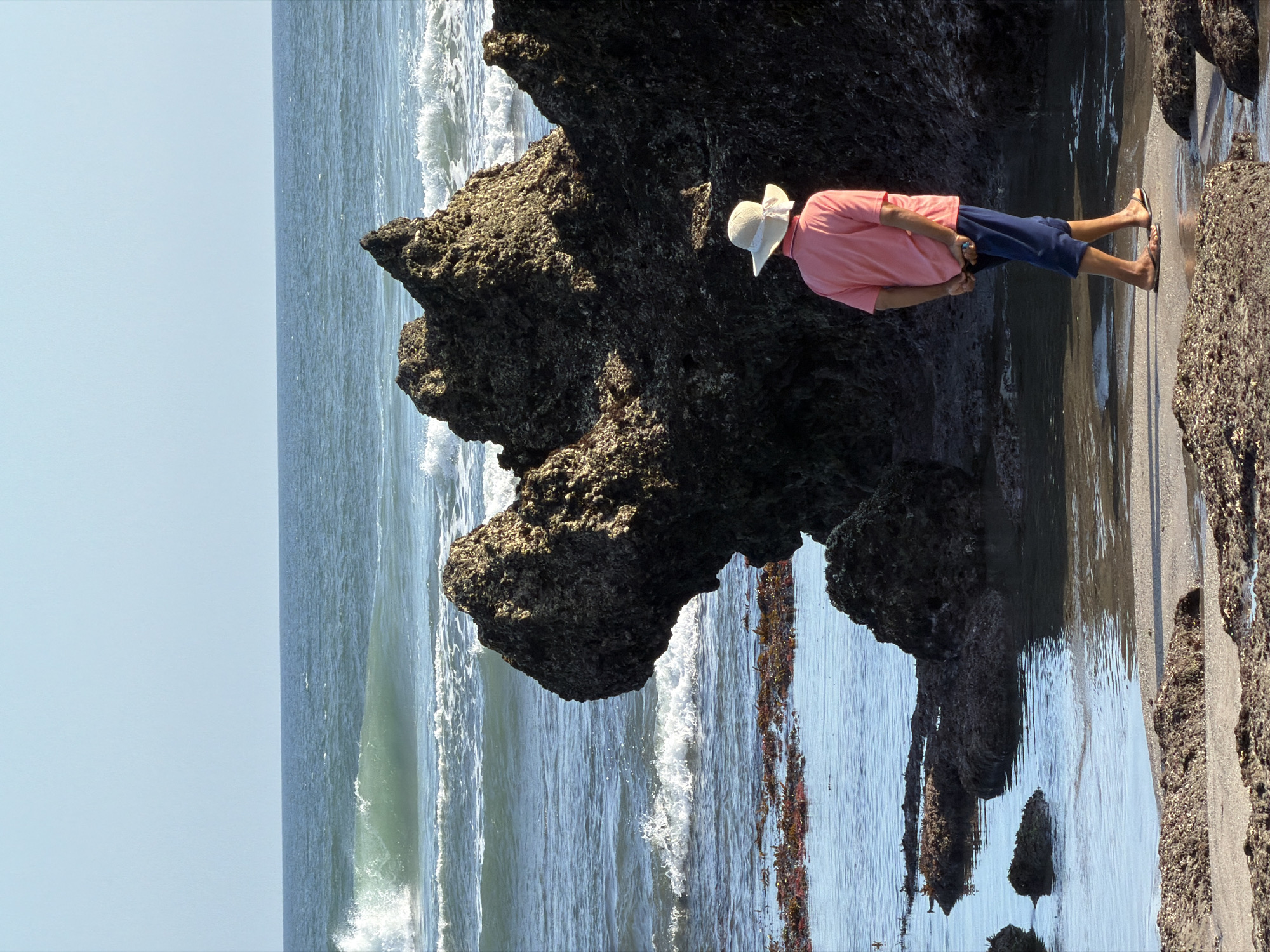 Morning beach activity along North Kuta's shoreline