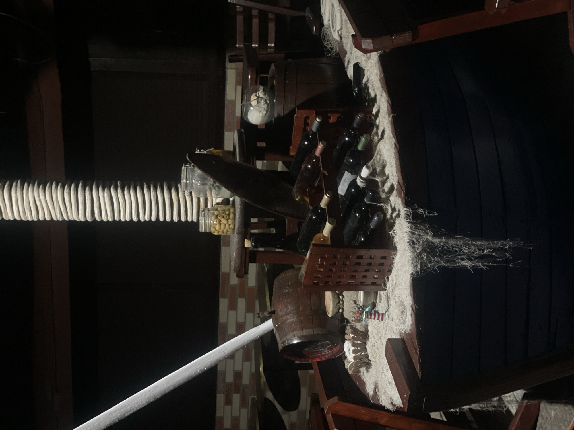 Nautical-themed store displays cannabis beverages, maritime decor observed