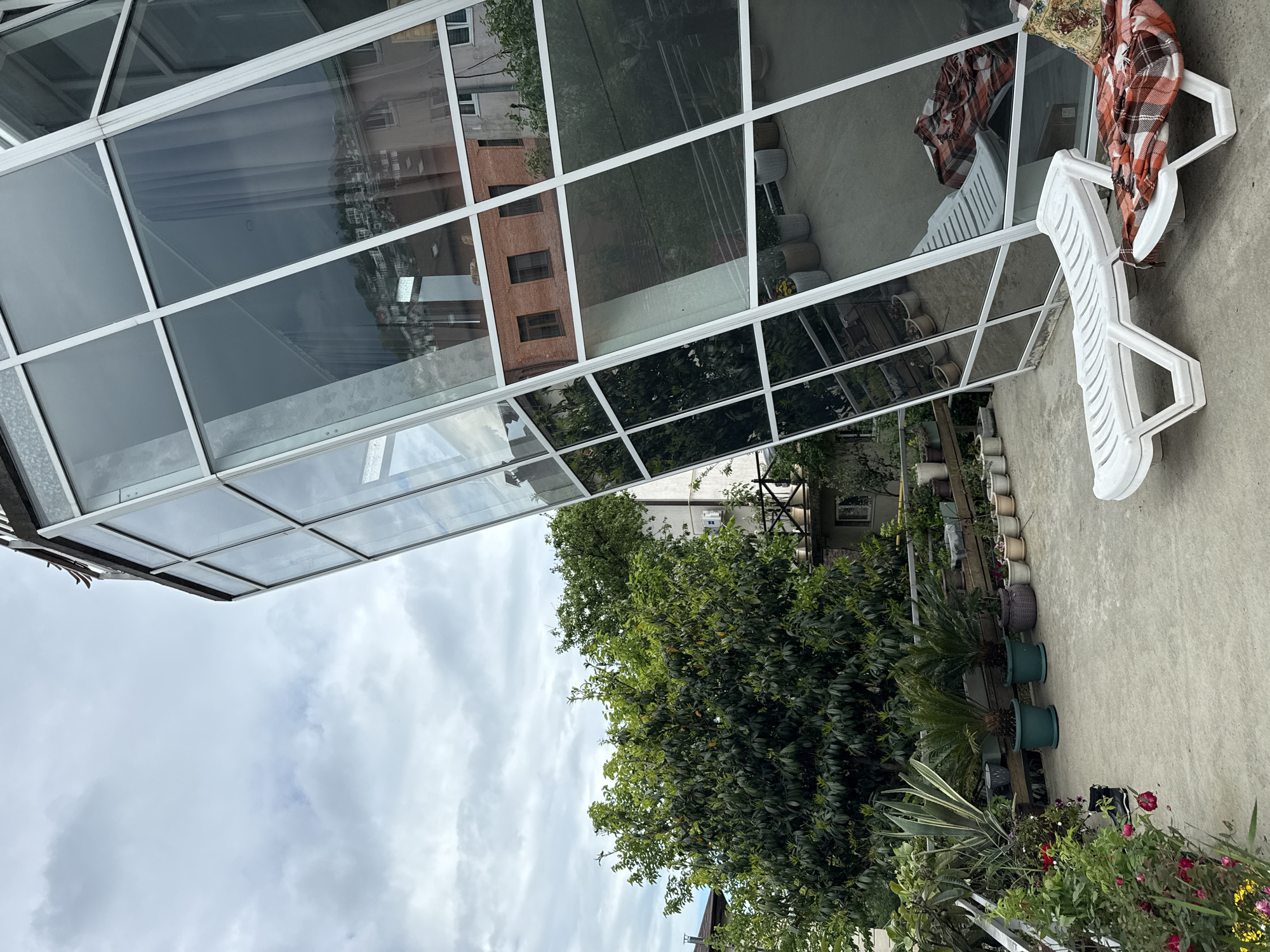 Backyard barbecue and gardening captured in Sochi residence