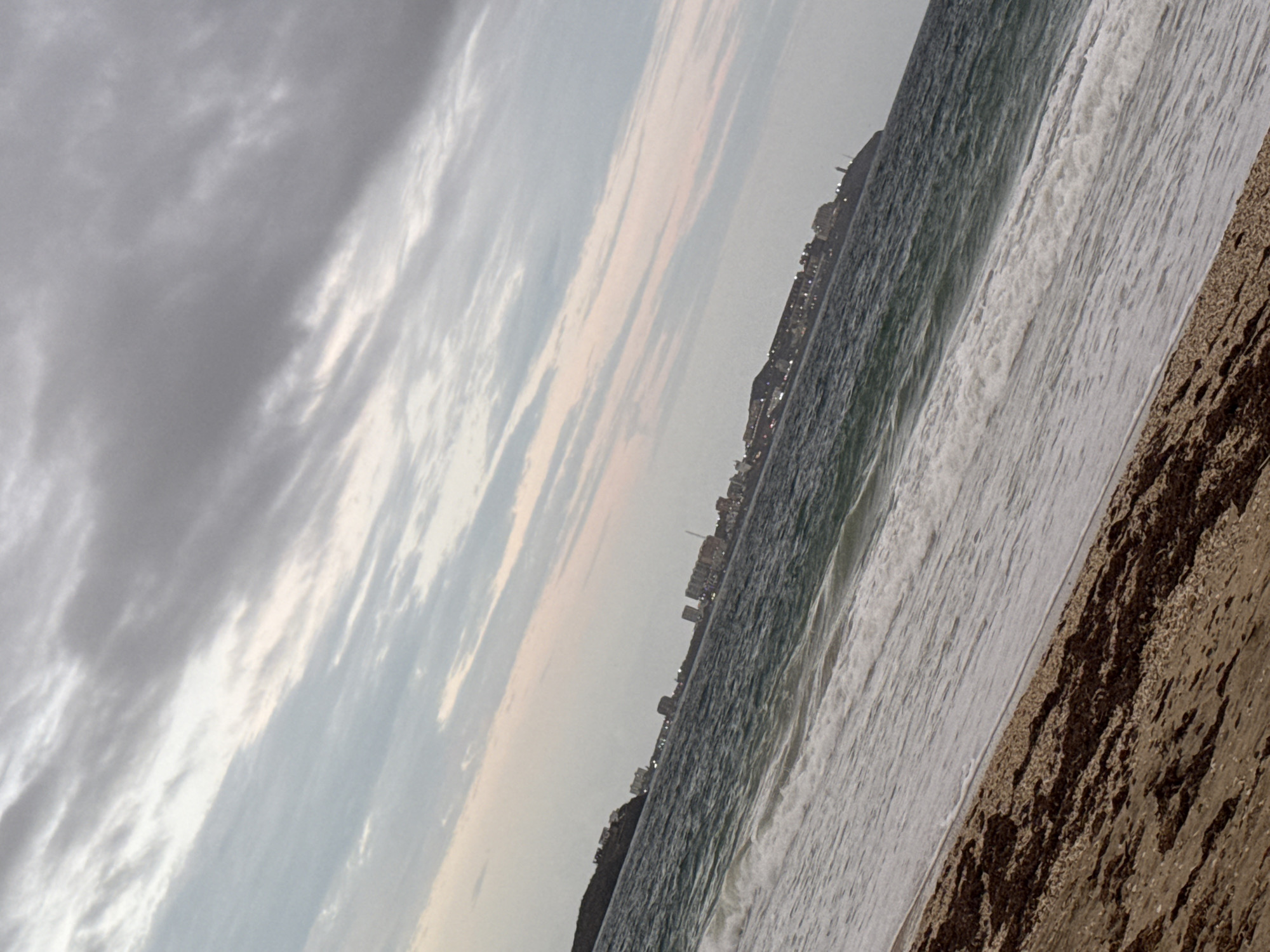 Photographer documents overcast beach scene in Porlamar, Venezuela