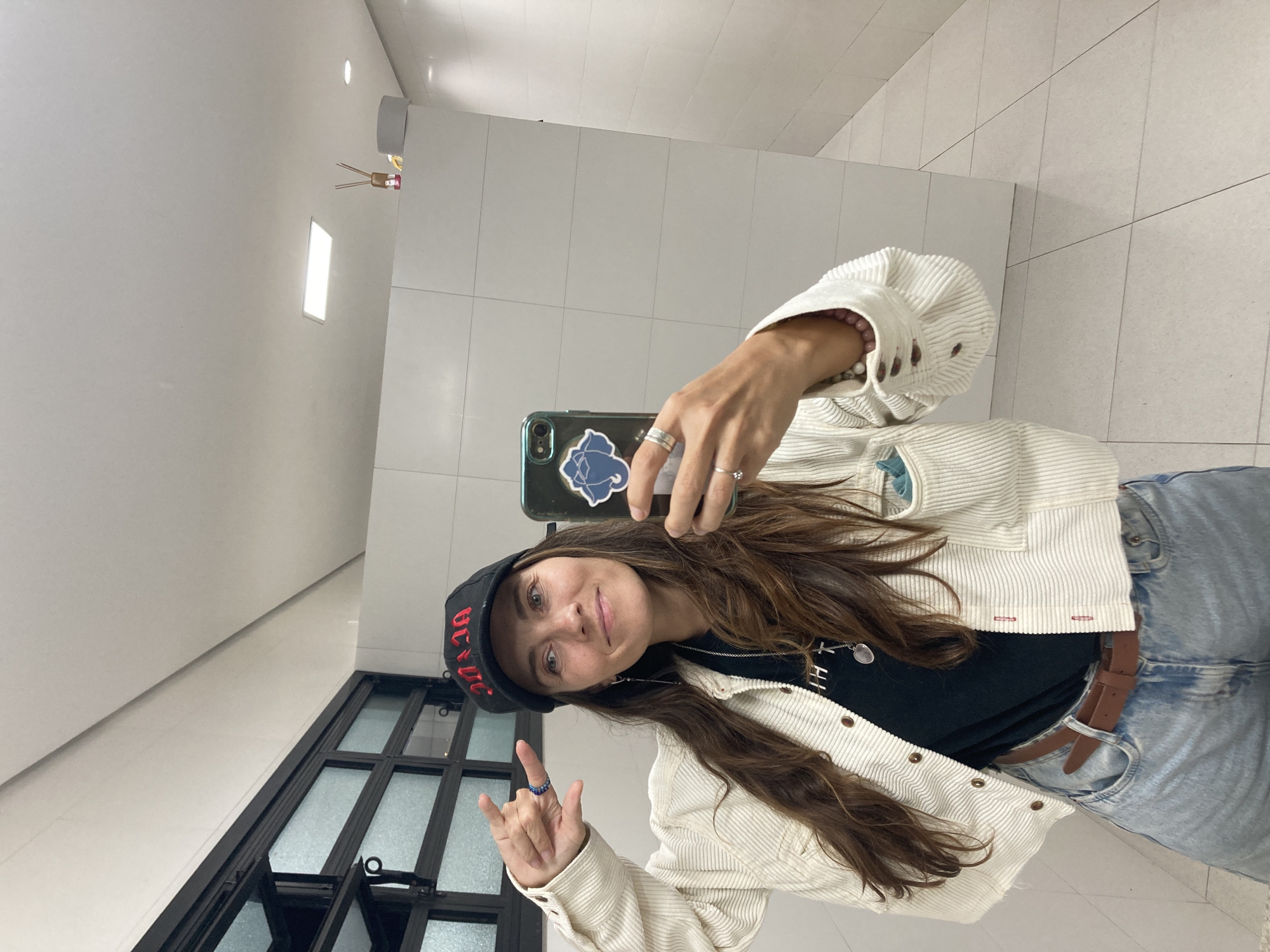 Woman takes bathroom selfie in Florianópolis, Brazil