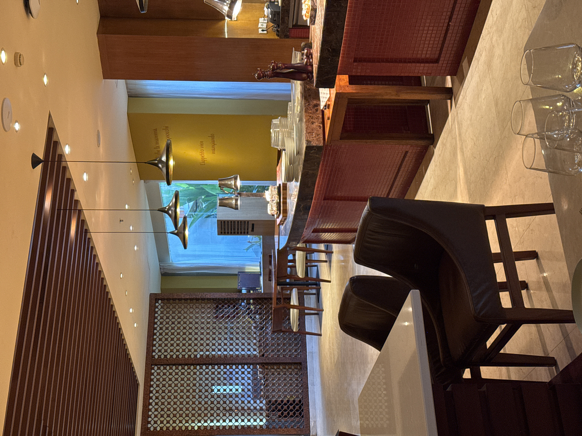 Inside a Kuta Selatan restaurant with a well-stocked wine rack