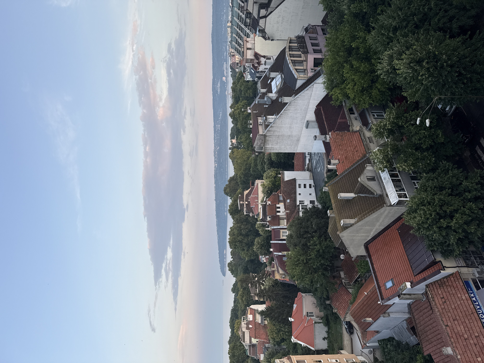 Varna rooftops and Black Sea horizon at golden hour