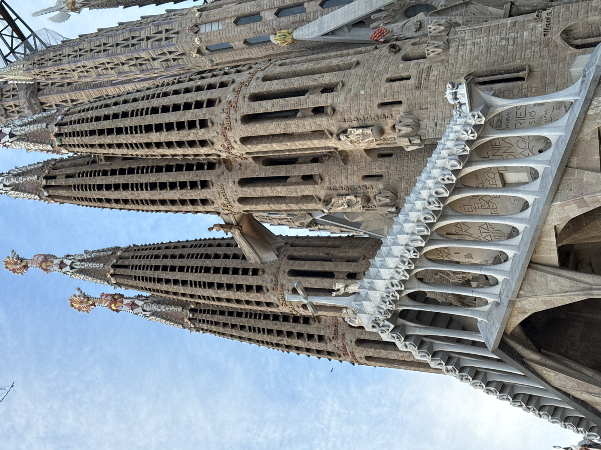 Barcelona tourists capture Sagrada Familia and city scenes