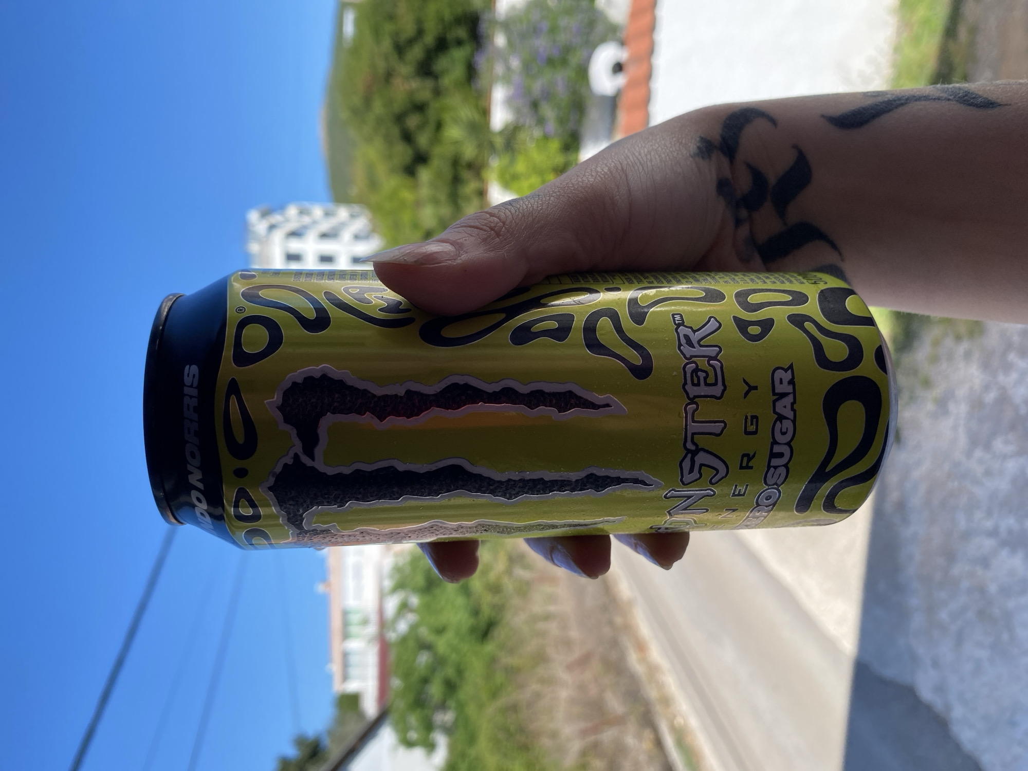 Person drinks Monster Energy in Kunje Montenegro residential area
