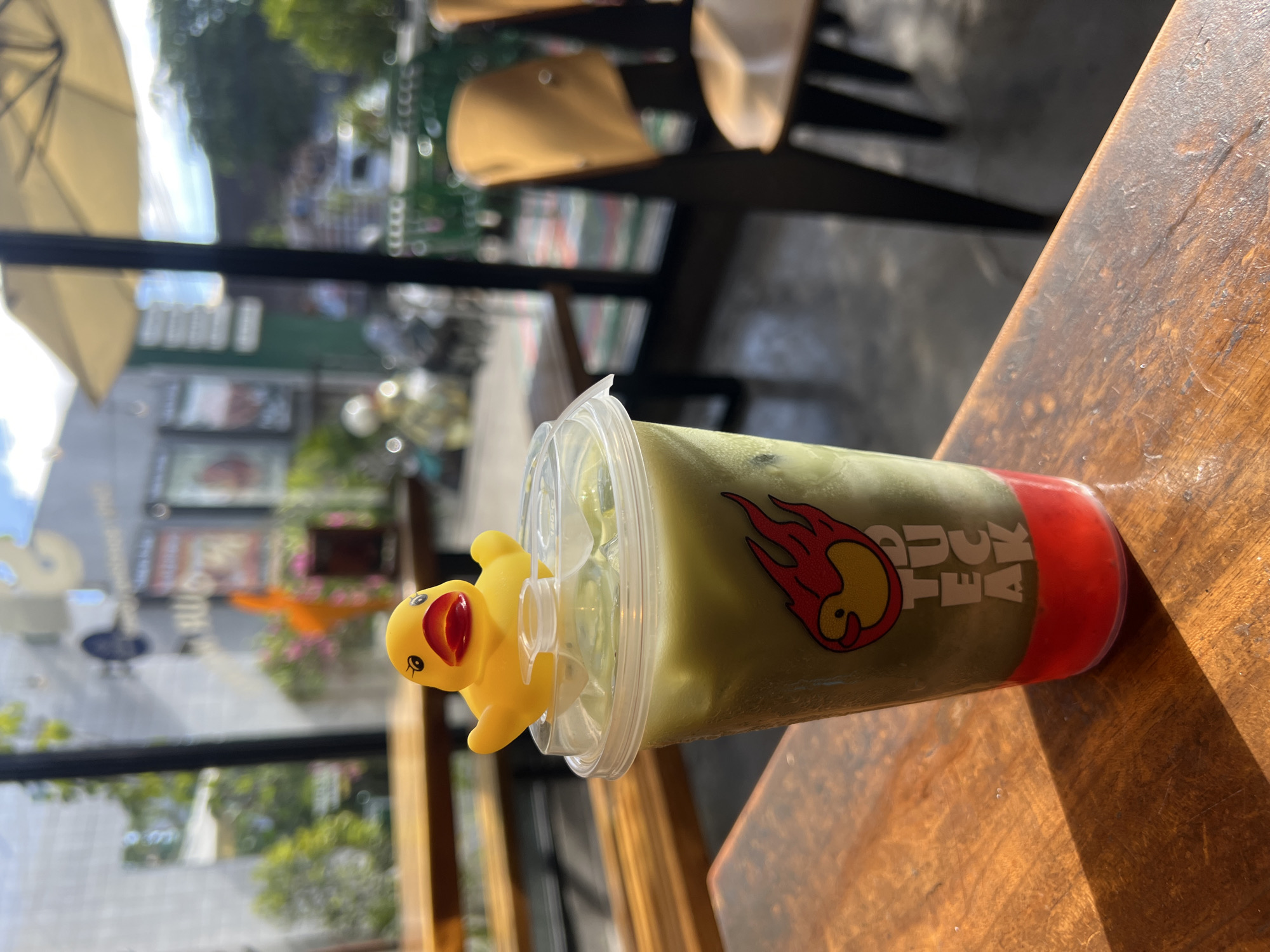 Morning breakfast documented at Kuta Selatan cafe with decorative duck