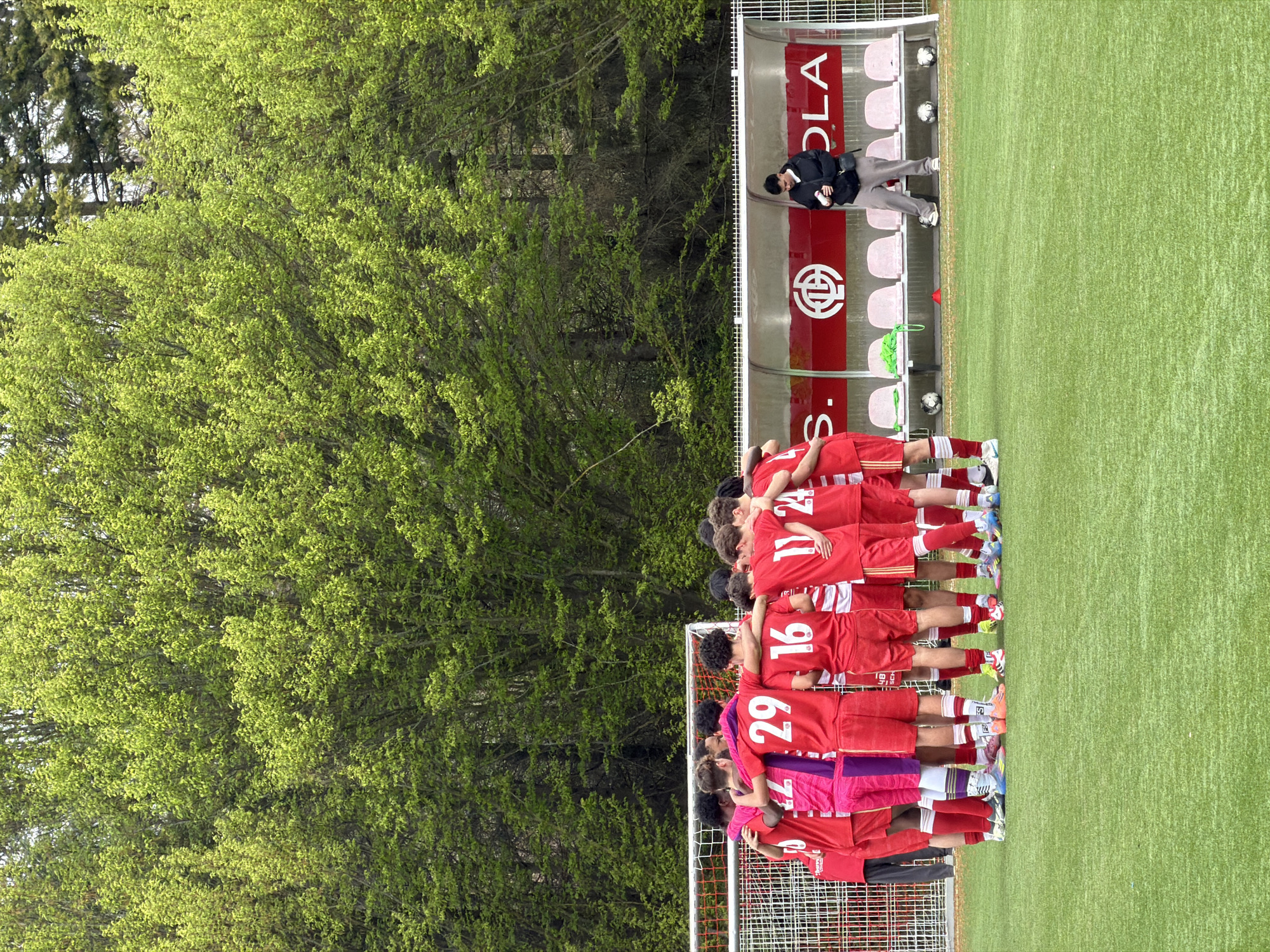 Spring day scenes captured at Luxembourg sports stadium