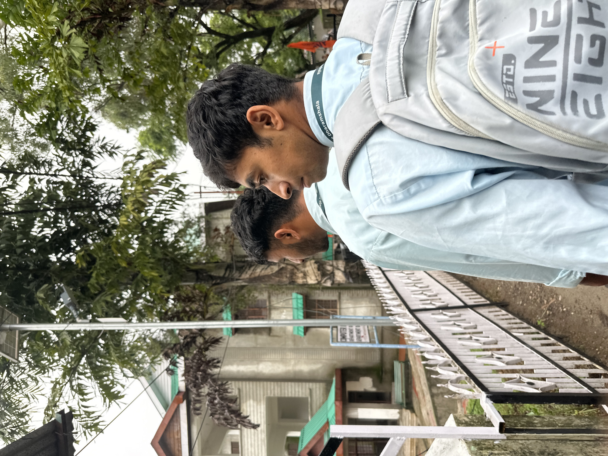 Students in uniform around a government college campus