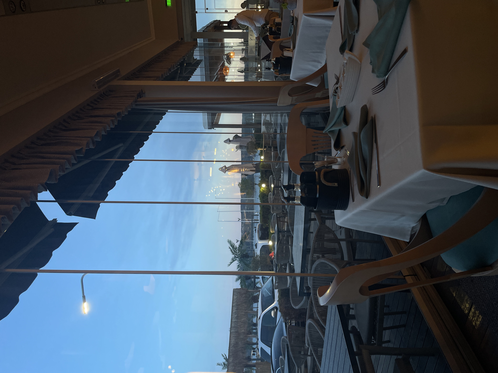 Restaurant dining room observed at dusk in Varna