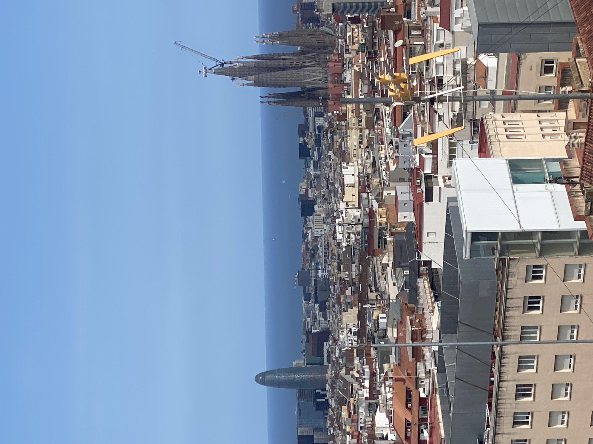 Barcelona cityscape captured from multiple angles during afternoon hours