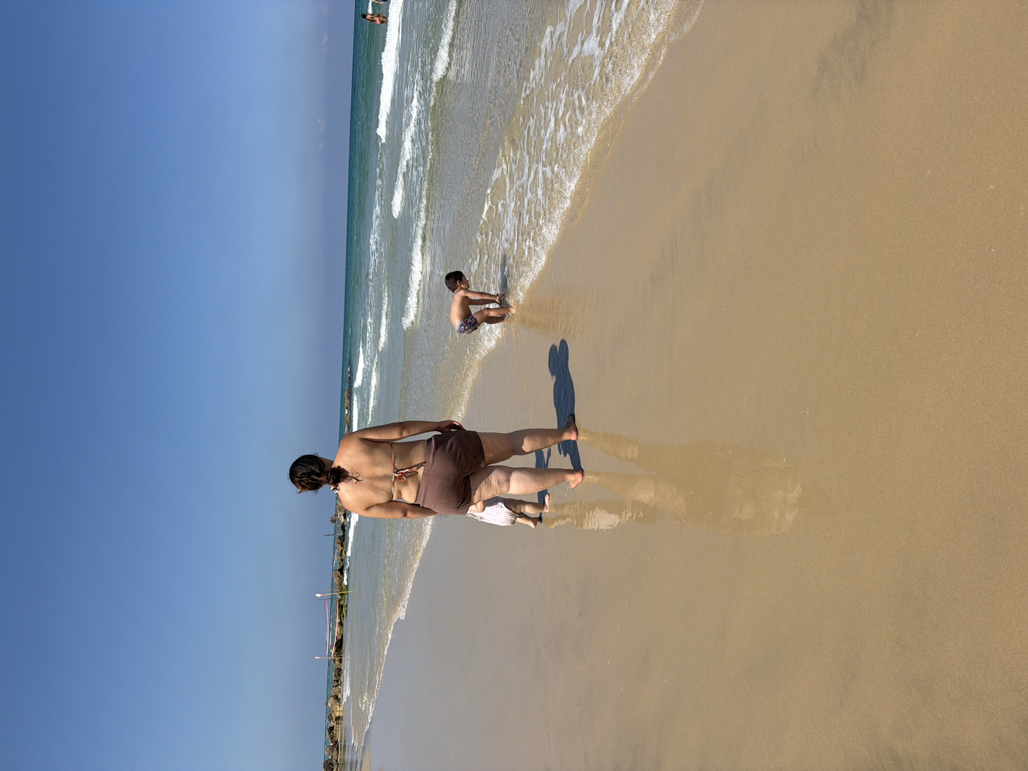 Morning beach day in Bat Yam — paddleboarding, swimming, sun