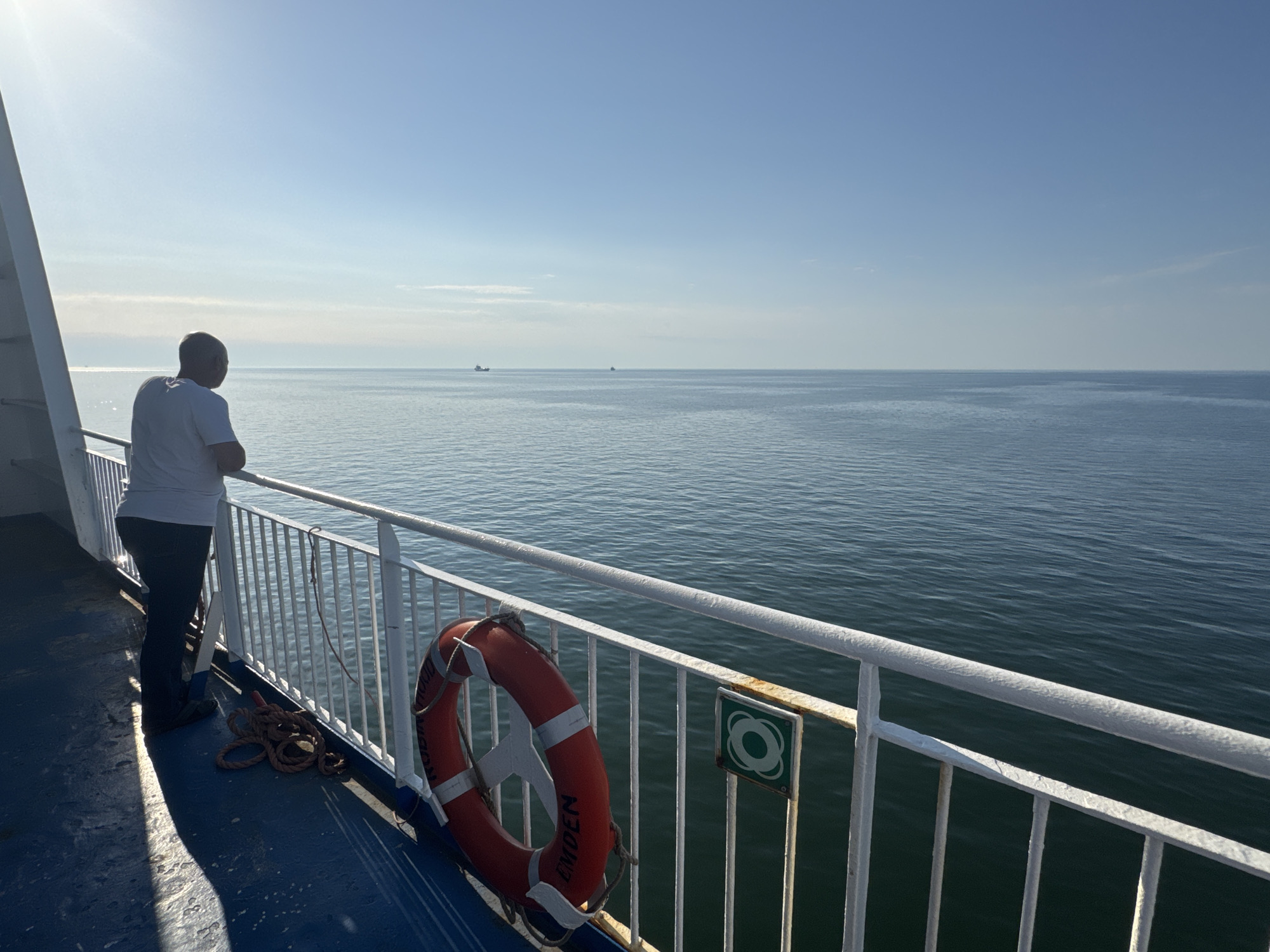 Quiet moment at the railing on a calm Baltic ferry crossing