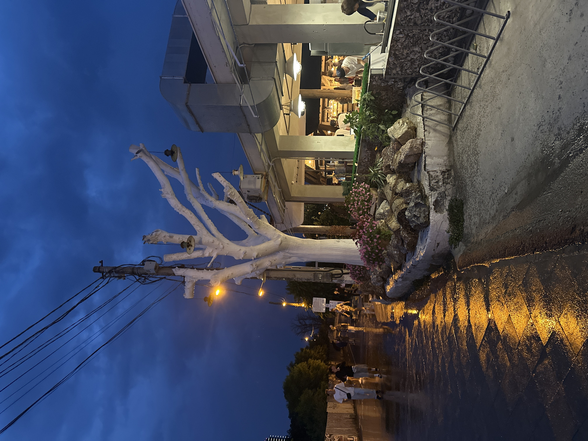 Wet summer night out on Odesa's pedestrian strip