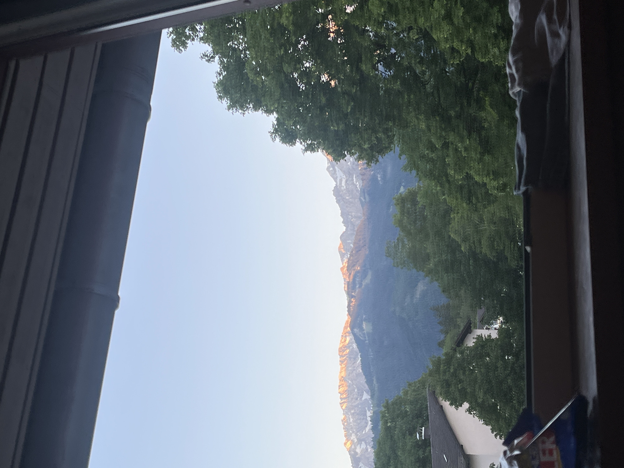 Window view captures scenic Garmisch-Partenkirchen landscape Friday evening