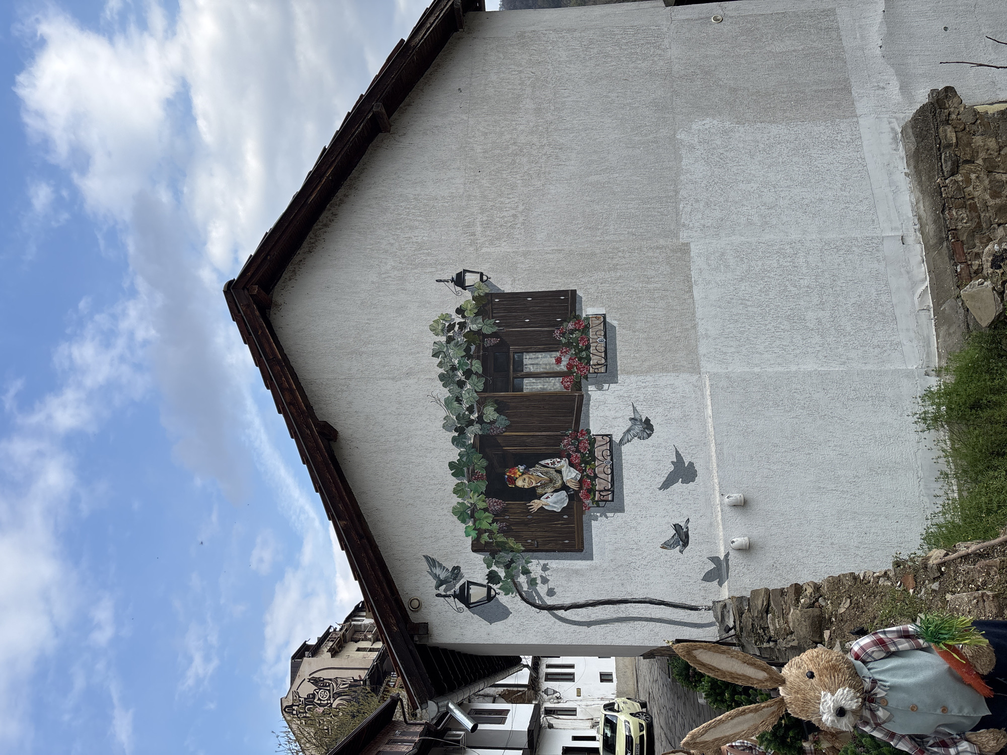 Tourist documents historic monuments and street art in Veliko Tarnovo