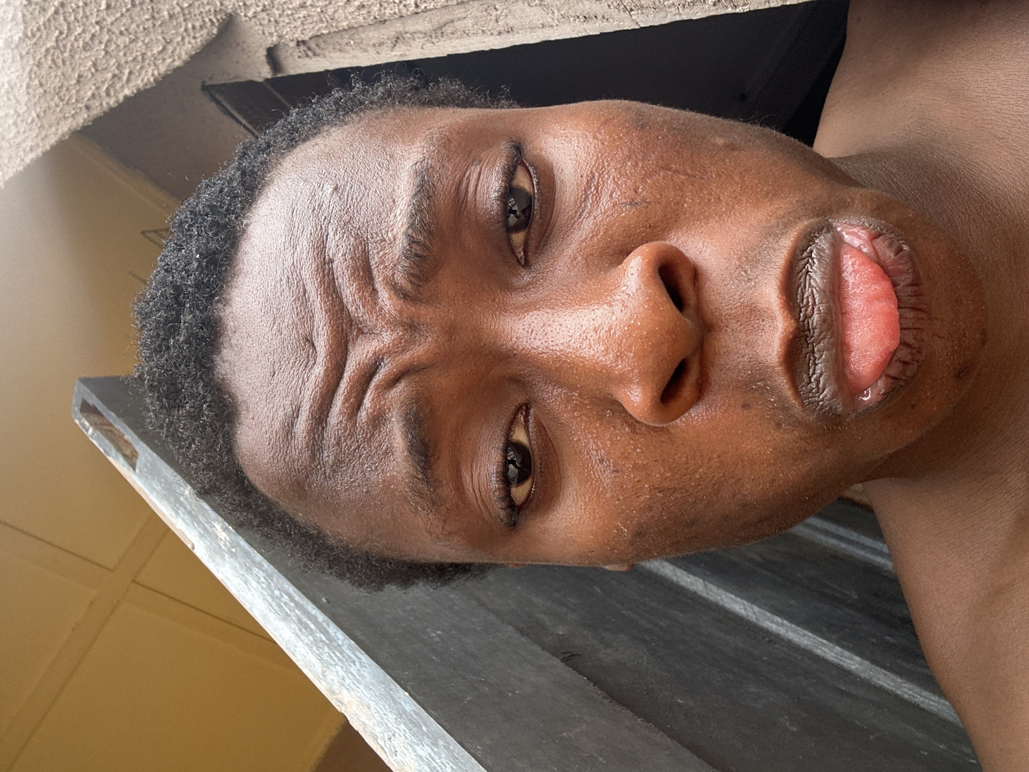 Person captured making varied expressions in 14 photos