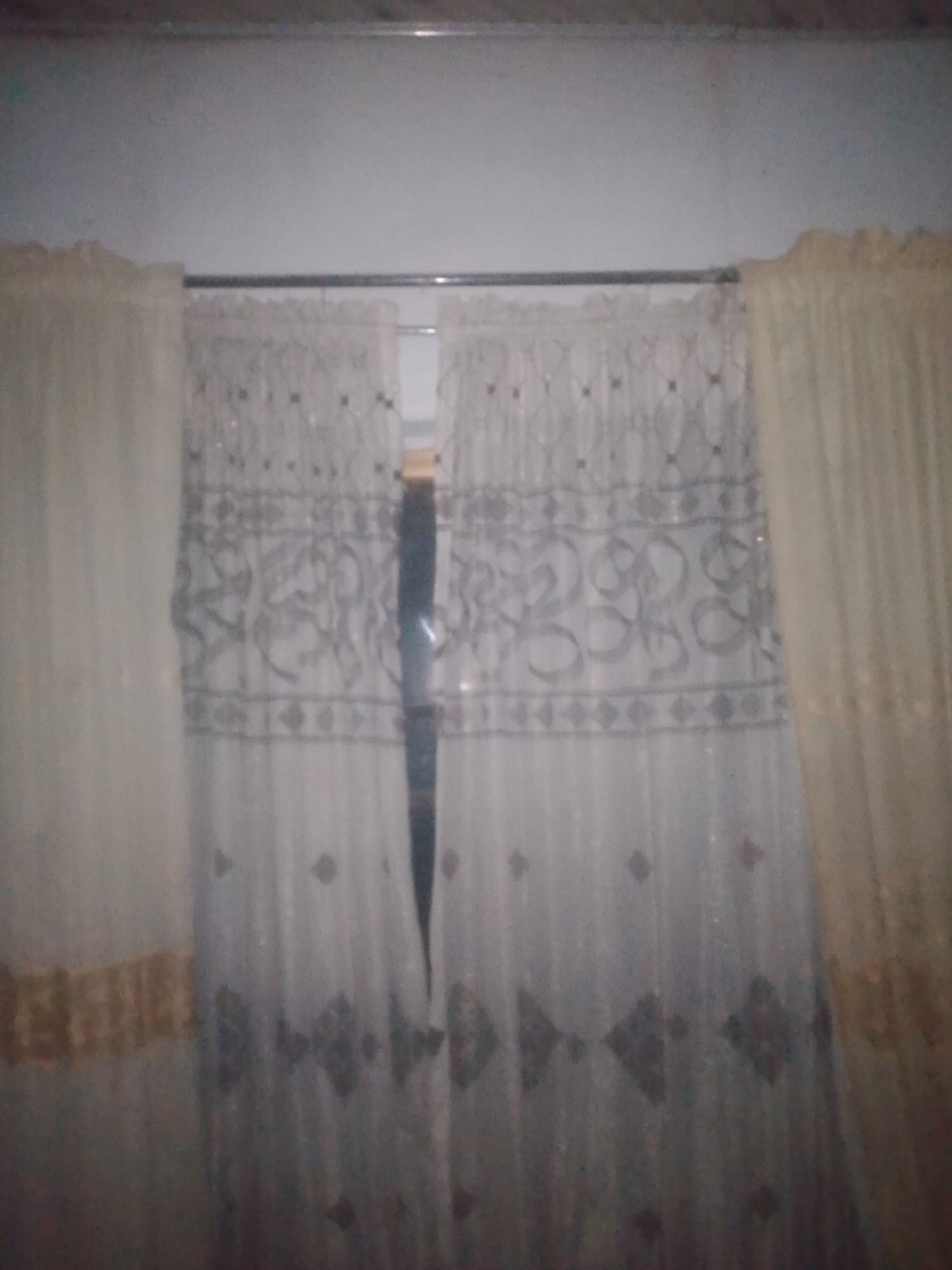 Indoors in Jauro Yinu: clothing, fabric, and everyday objects