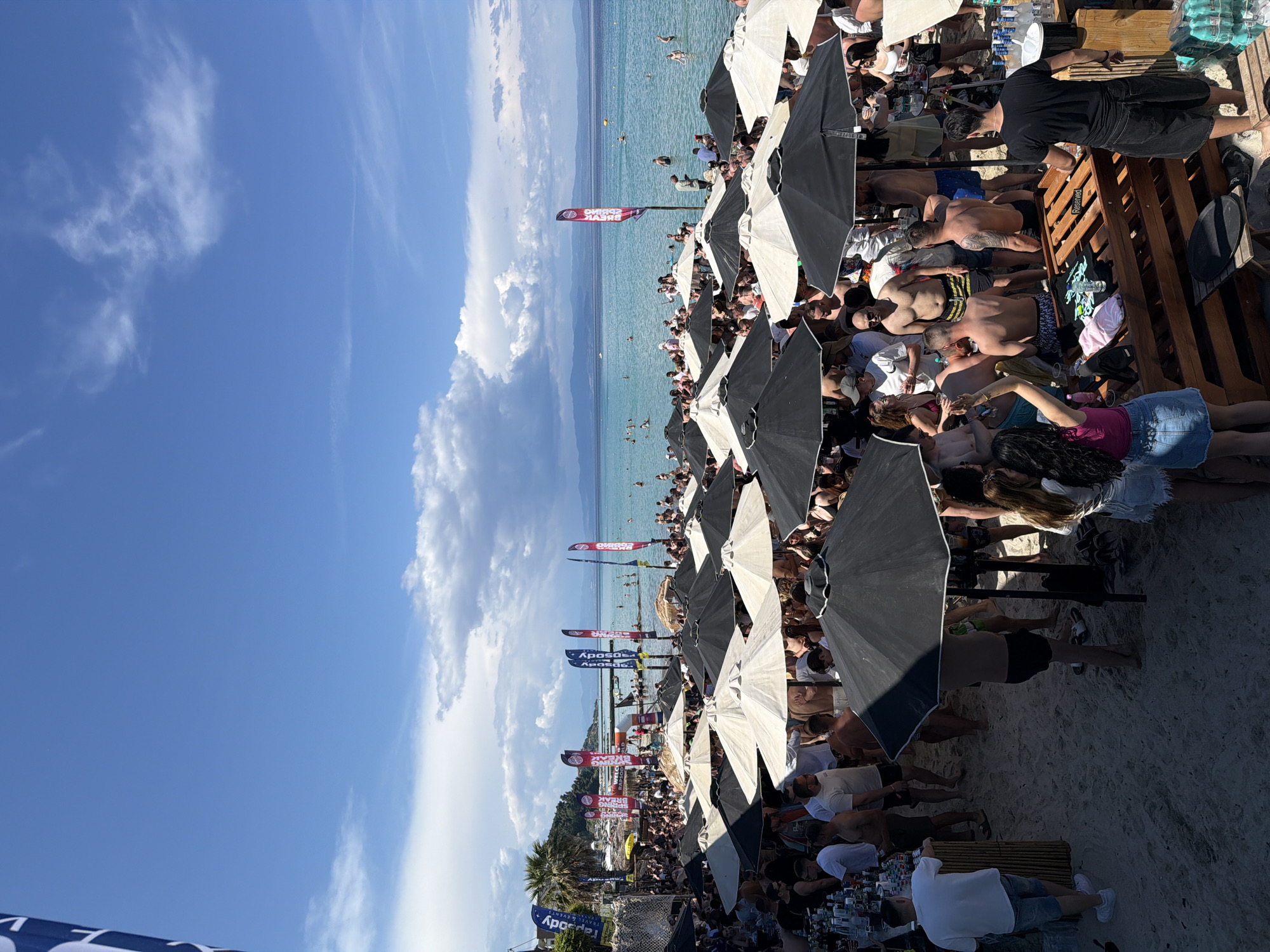 Busy beach day draws crowds for swimming and sunbathing