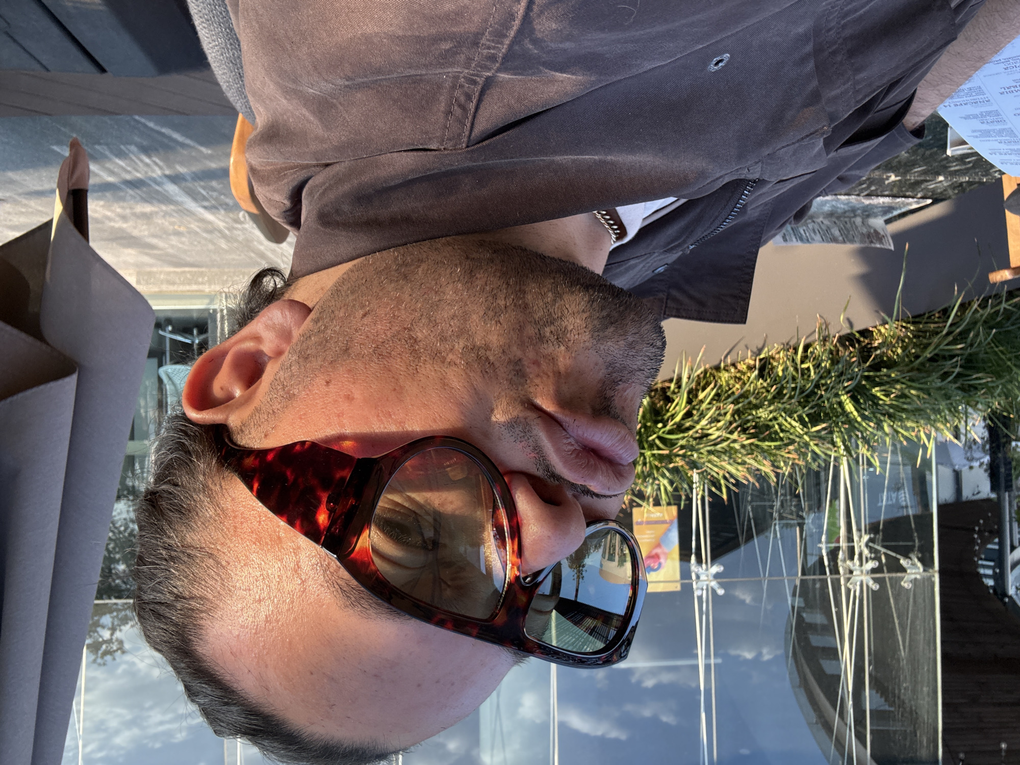 Man photographed dining at outdoor cafe in Puebla, Mexico